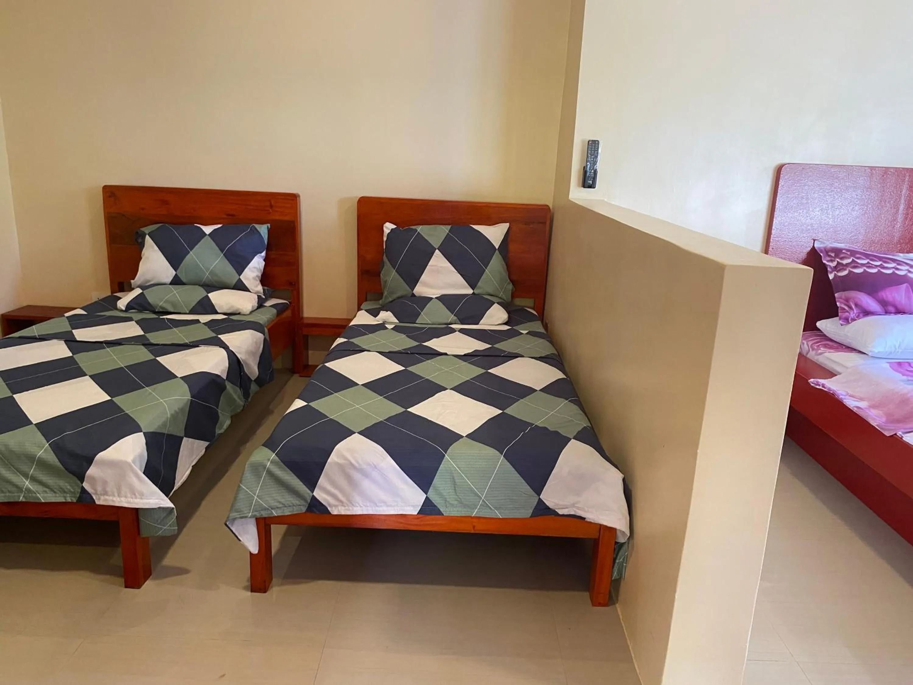 Bed in Siargao Sunset Bay Beach Villas