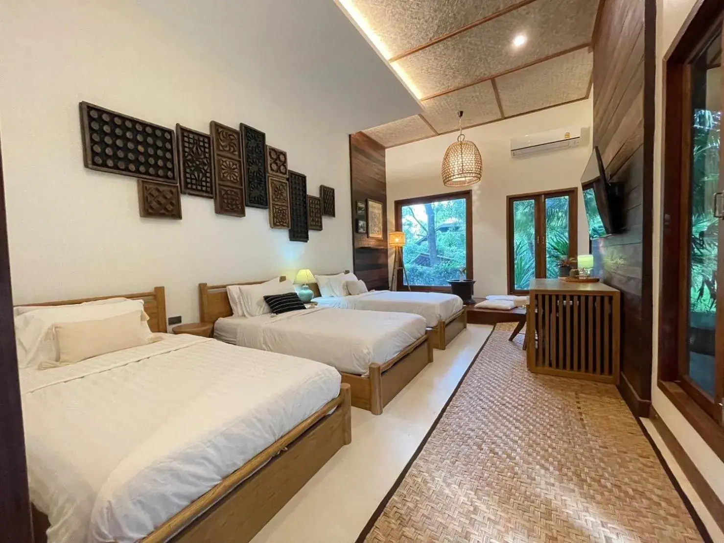 Triple Room with Garden View in Tai Resort Triple Room with Garden View in Tai Resort