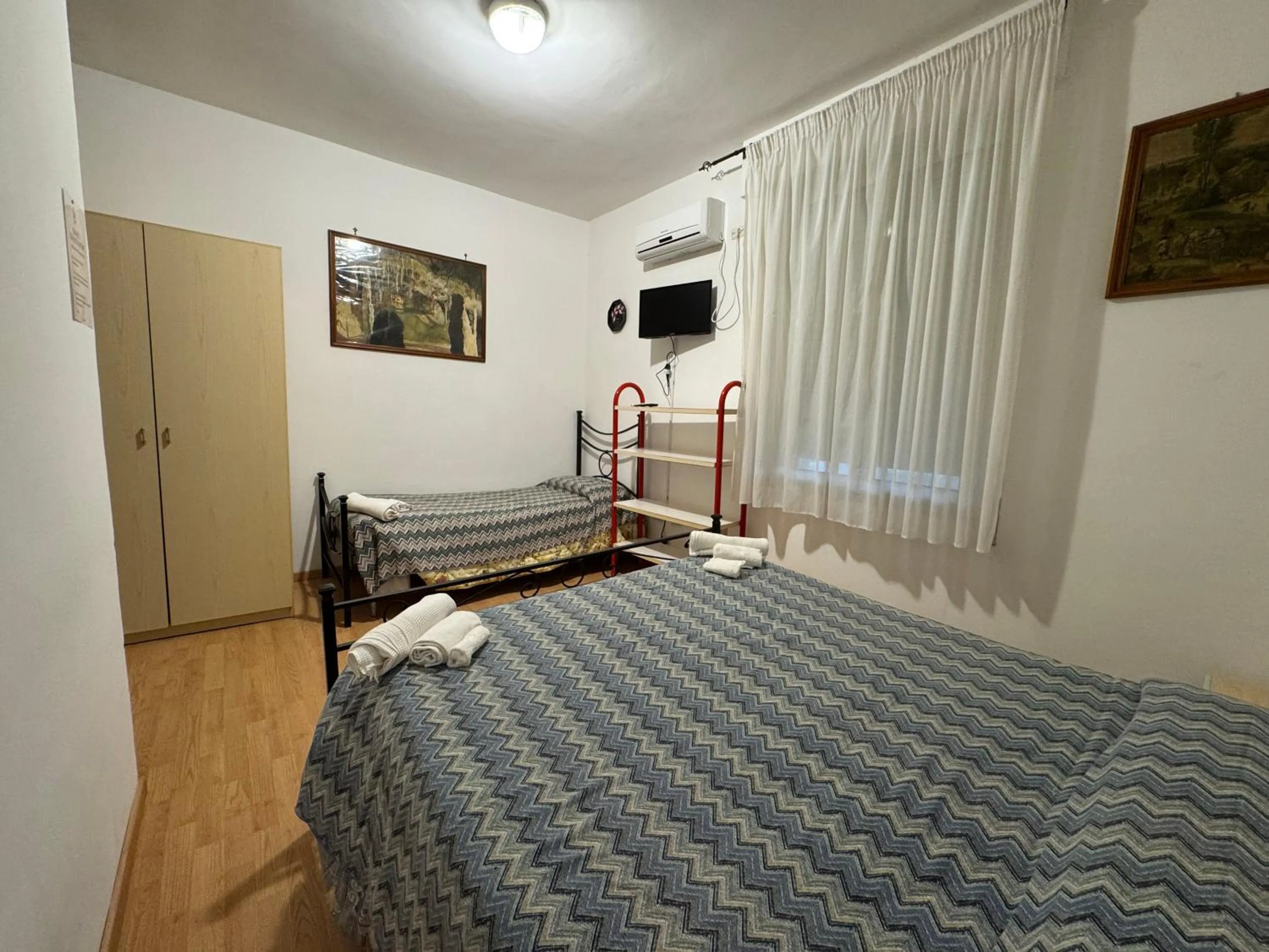 Bed in Hotel Paradiso