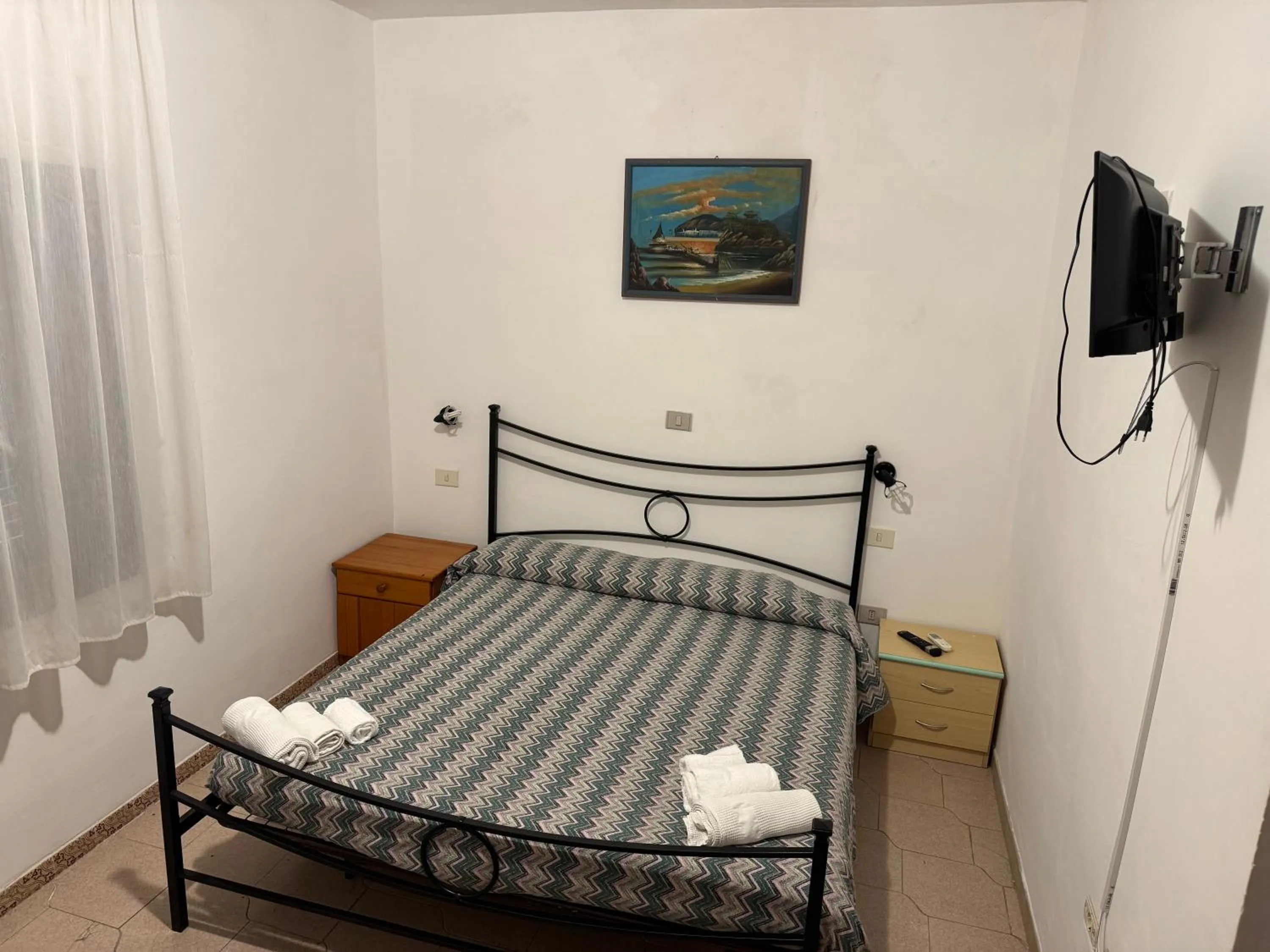 Bed in Hotel Paradiso