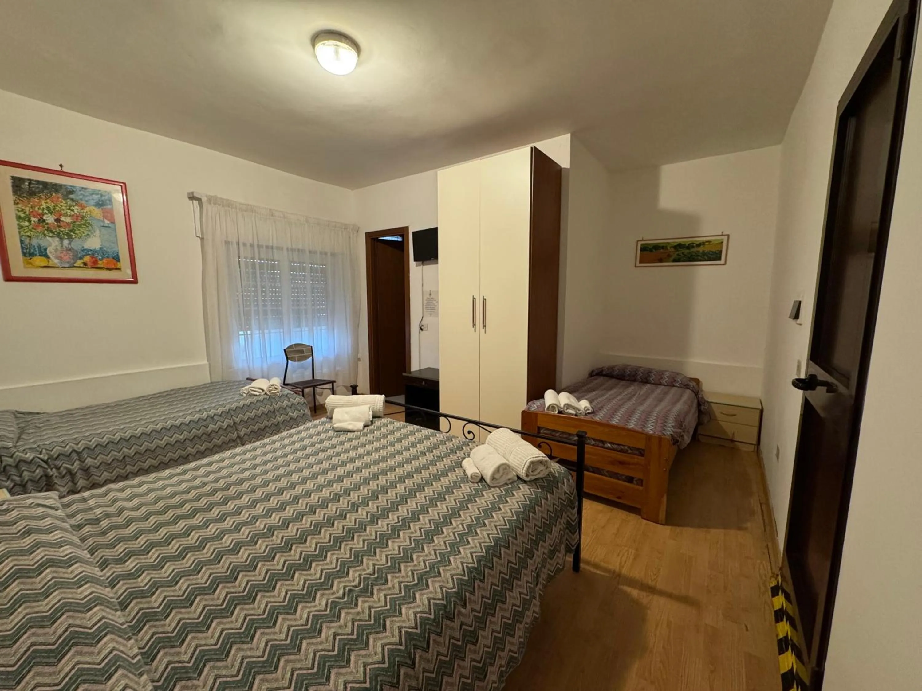 Bed in Hotel Paradiso