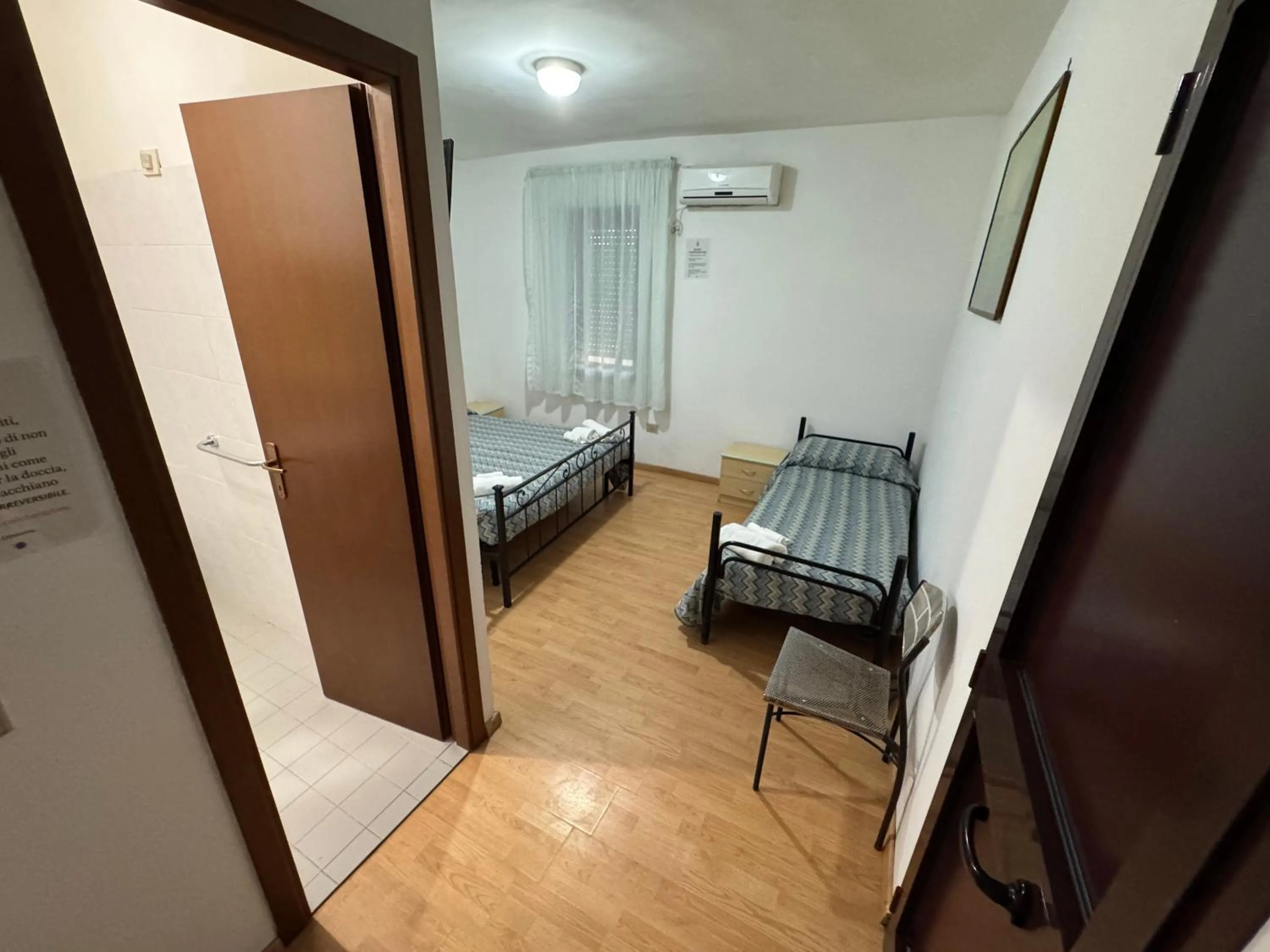 Bed in Hotel Paradiso