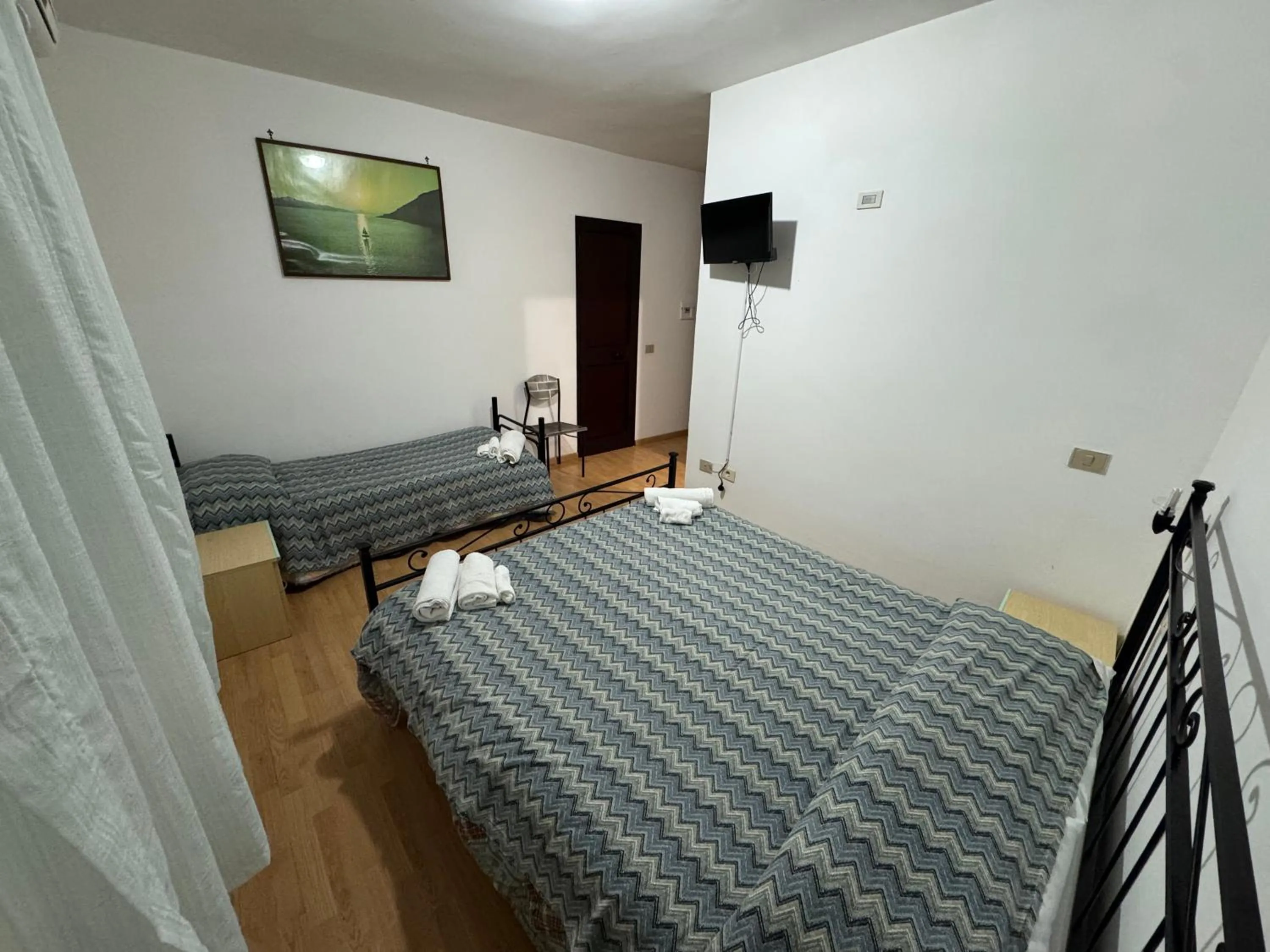 Bed in Hotel Paradiso