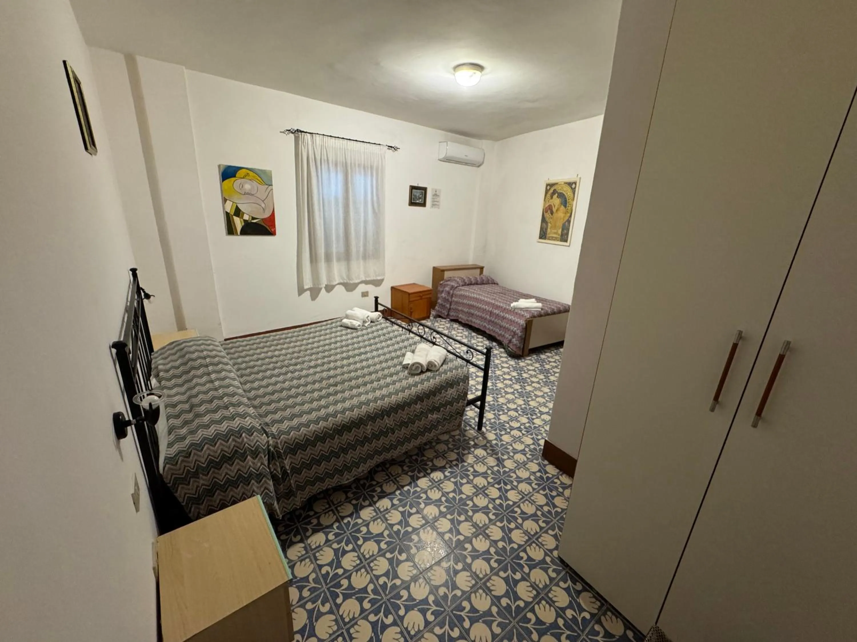 Bed in Hotel Paradiso