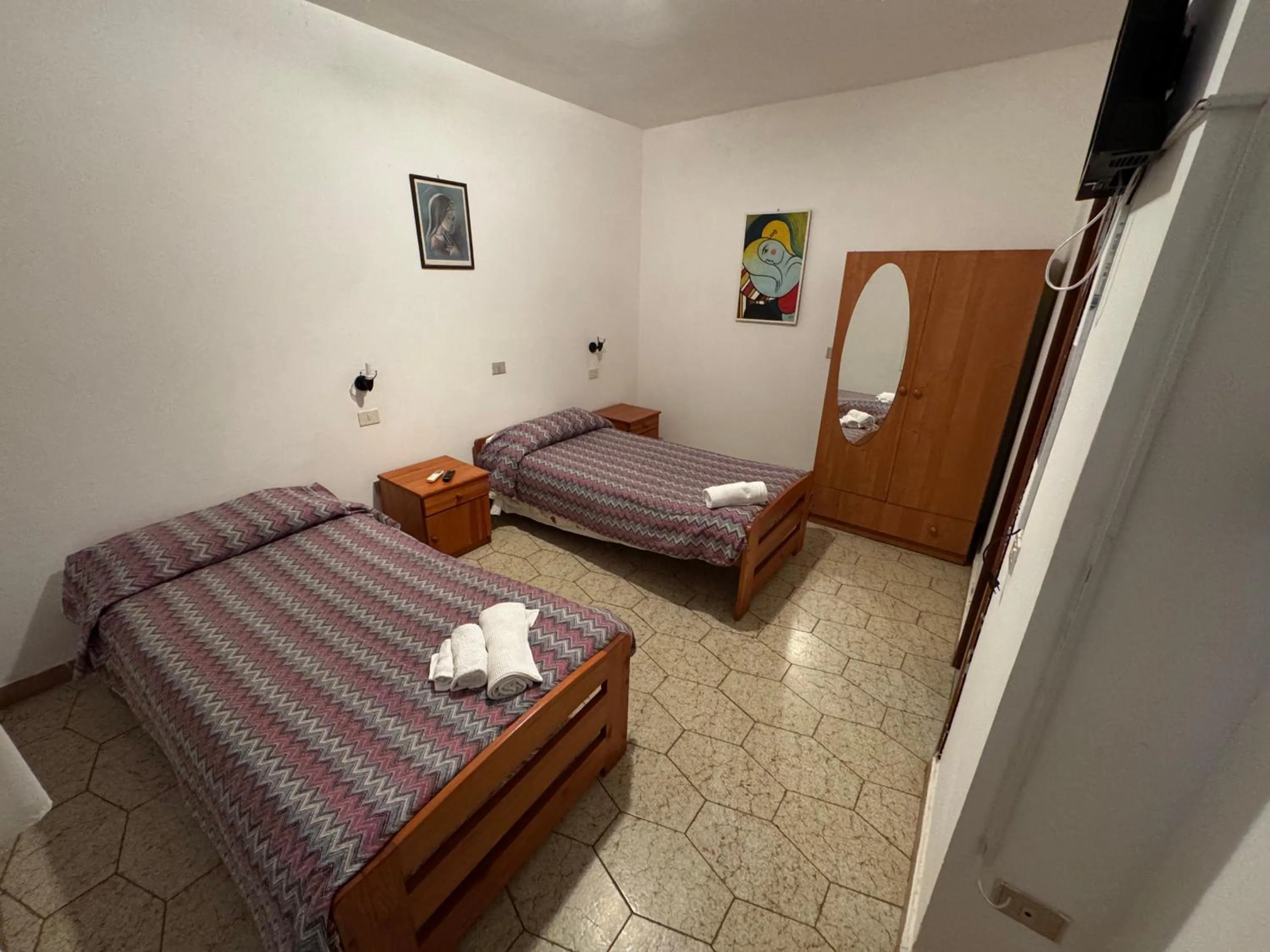 Bed in Hotel Paradiso