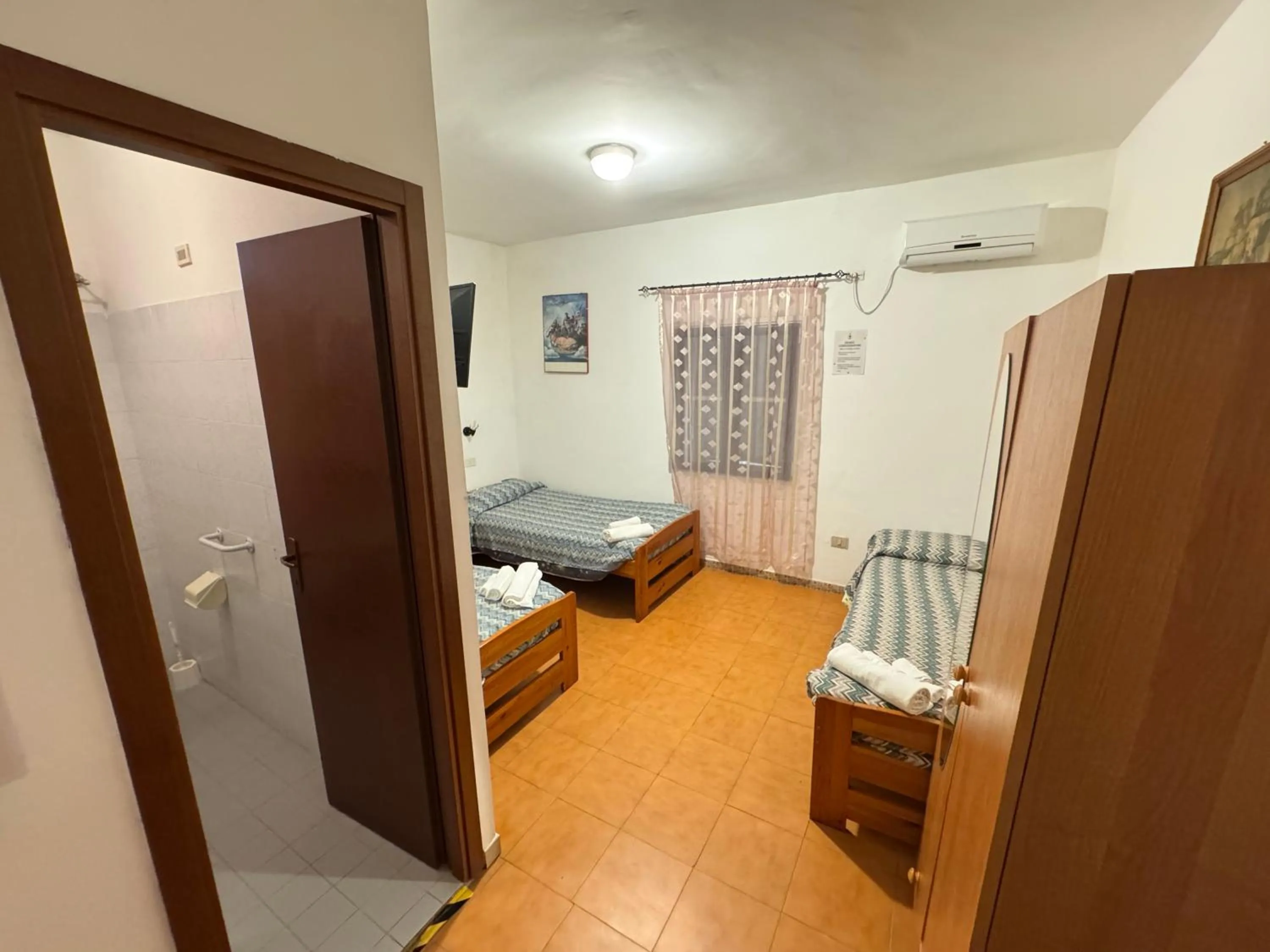 Bed in Hotel Paradiso