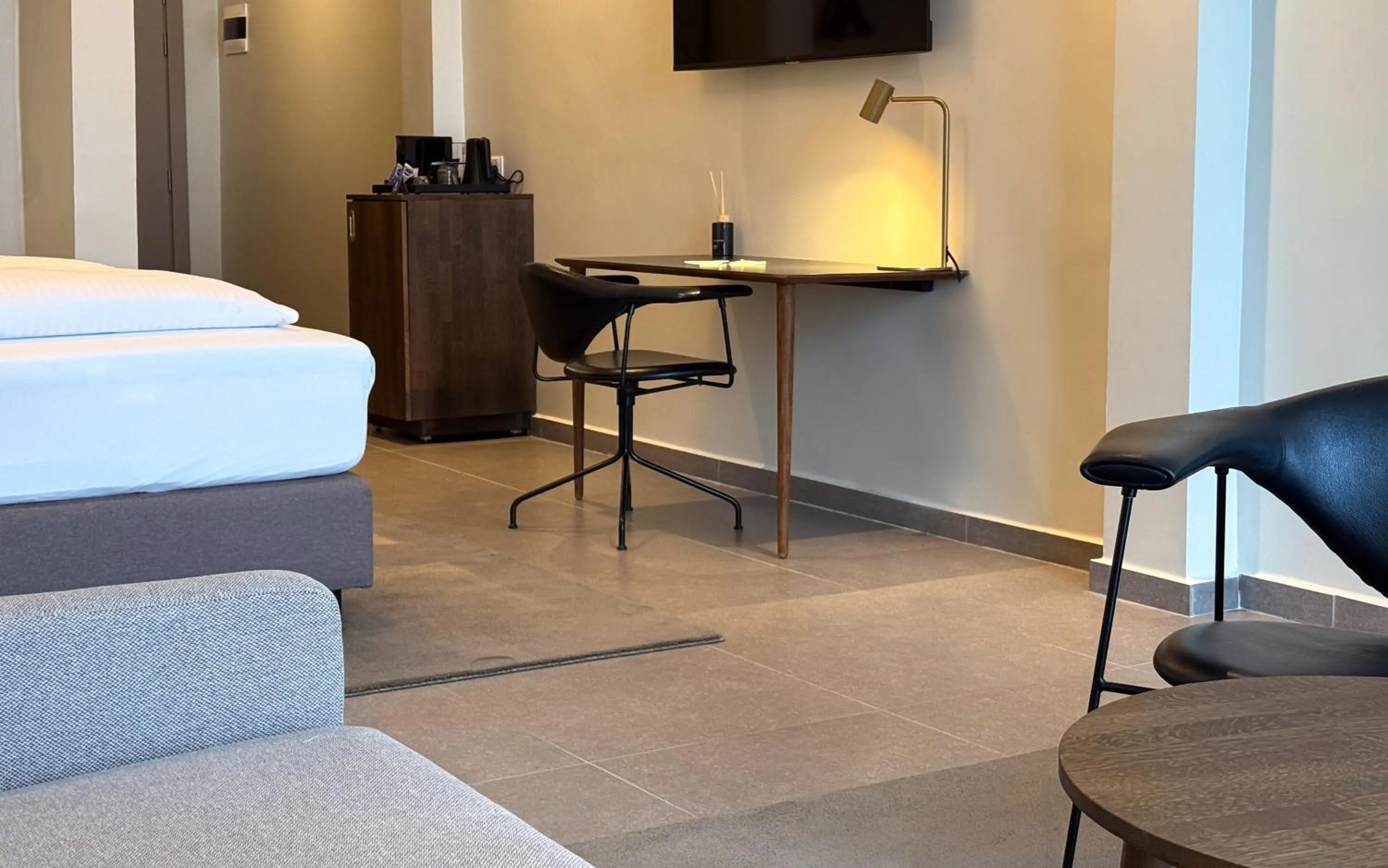 Seating area, Bed in The Nordic Abuja