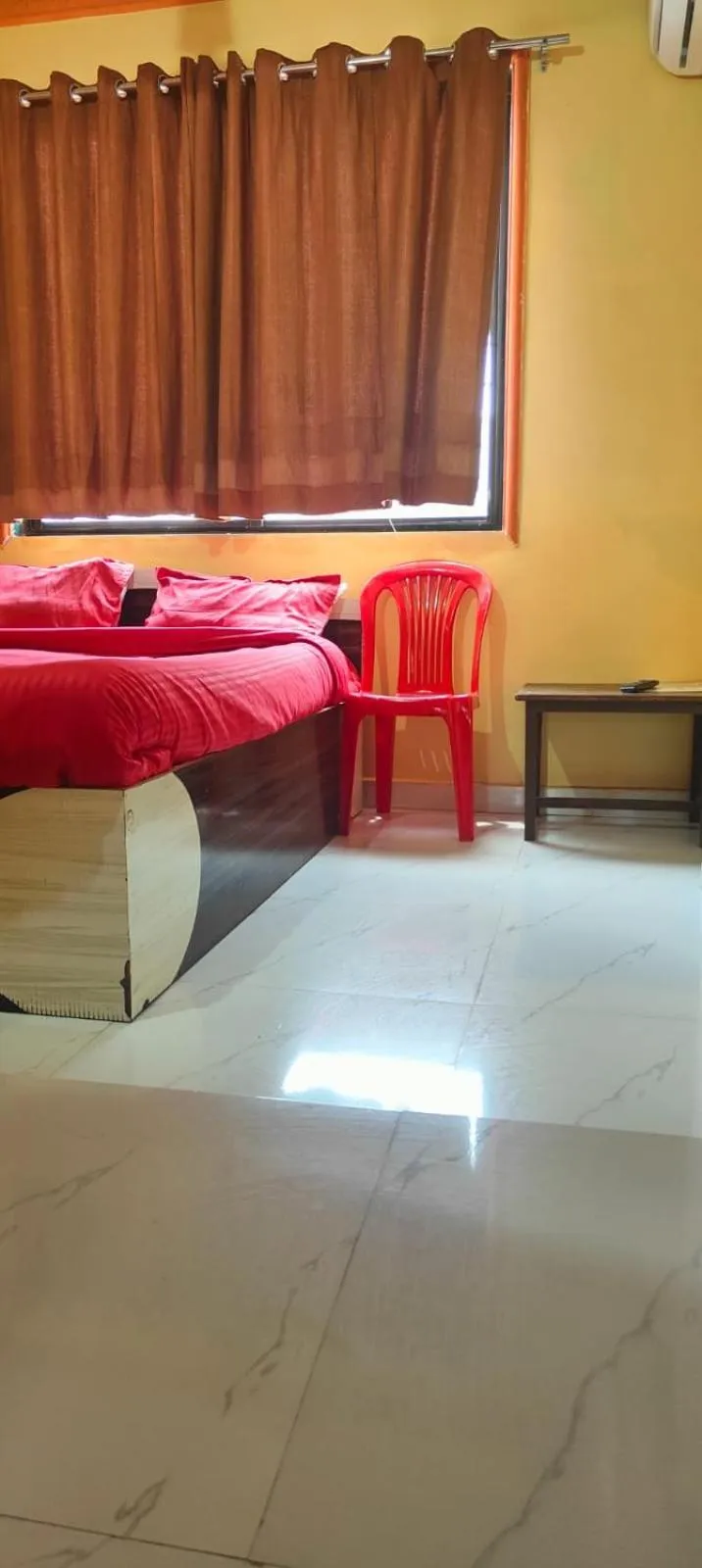 Bed in Hotel Krishna Palace