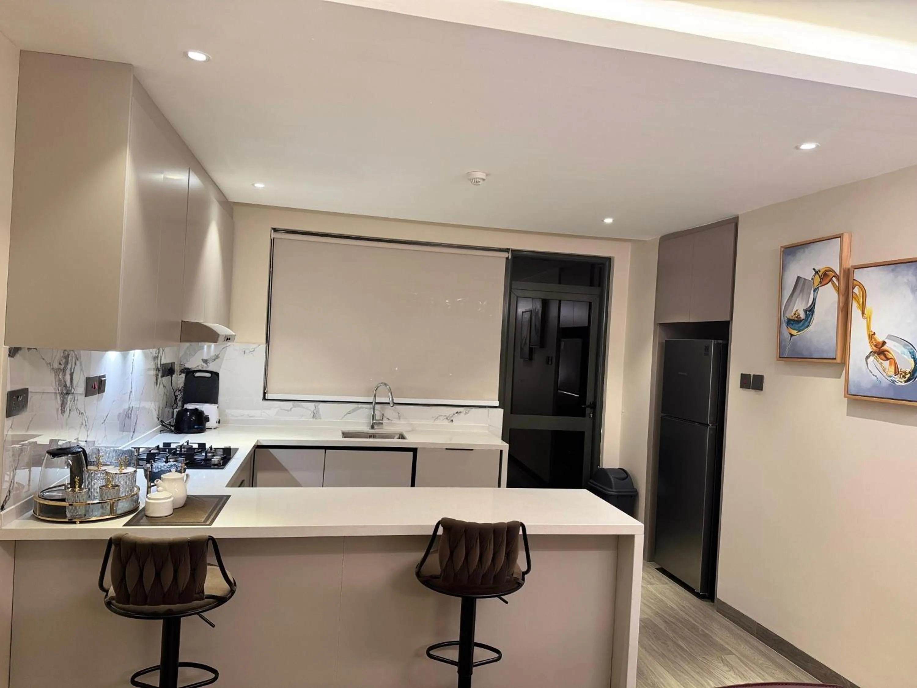 Kitchen or kitchenette in Abrish Hotel and Apartment