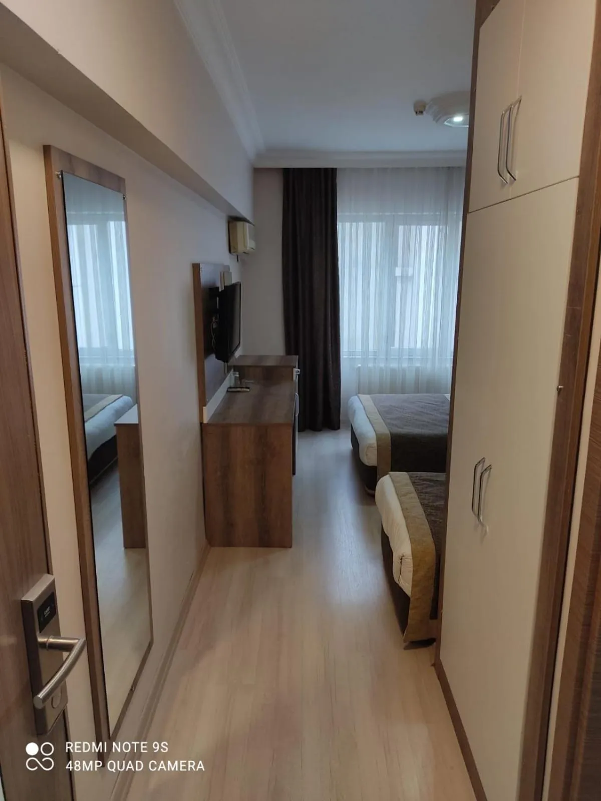 Seating area, Bed in Dempa Hotel