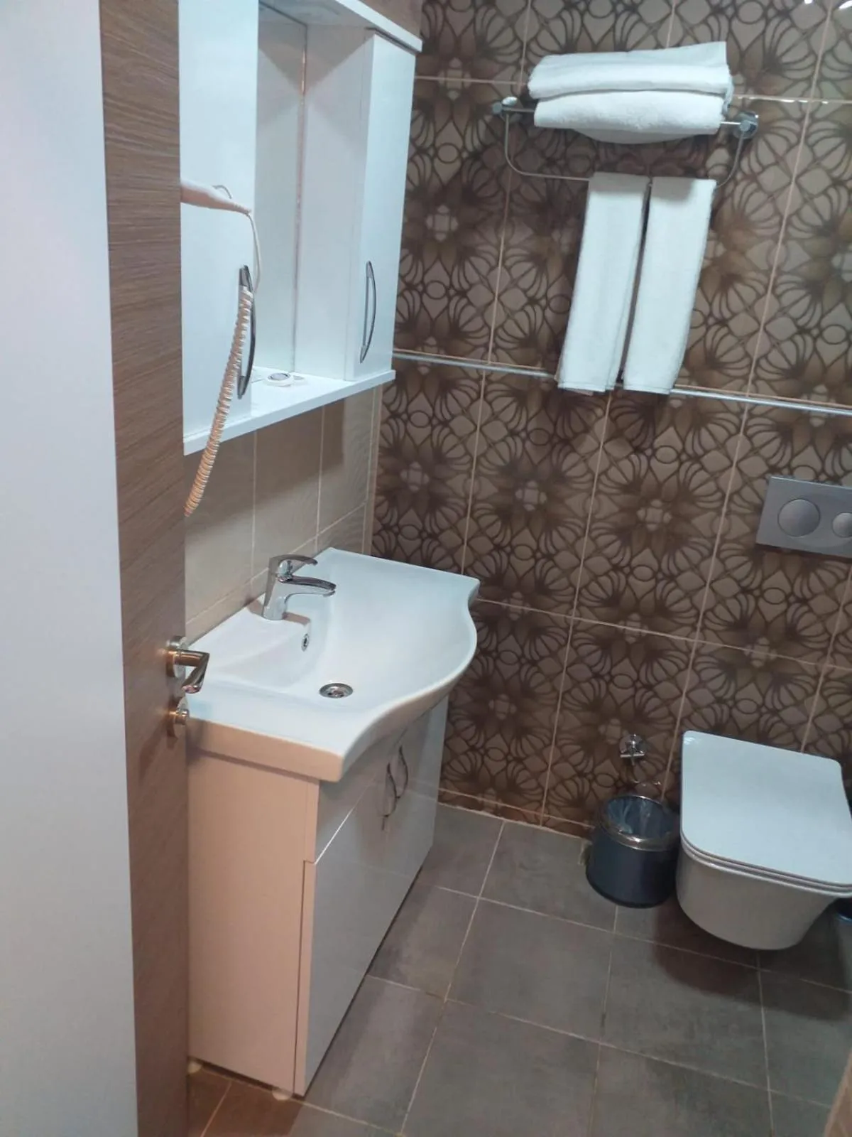 Bathroom in Dempa Hotel