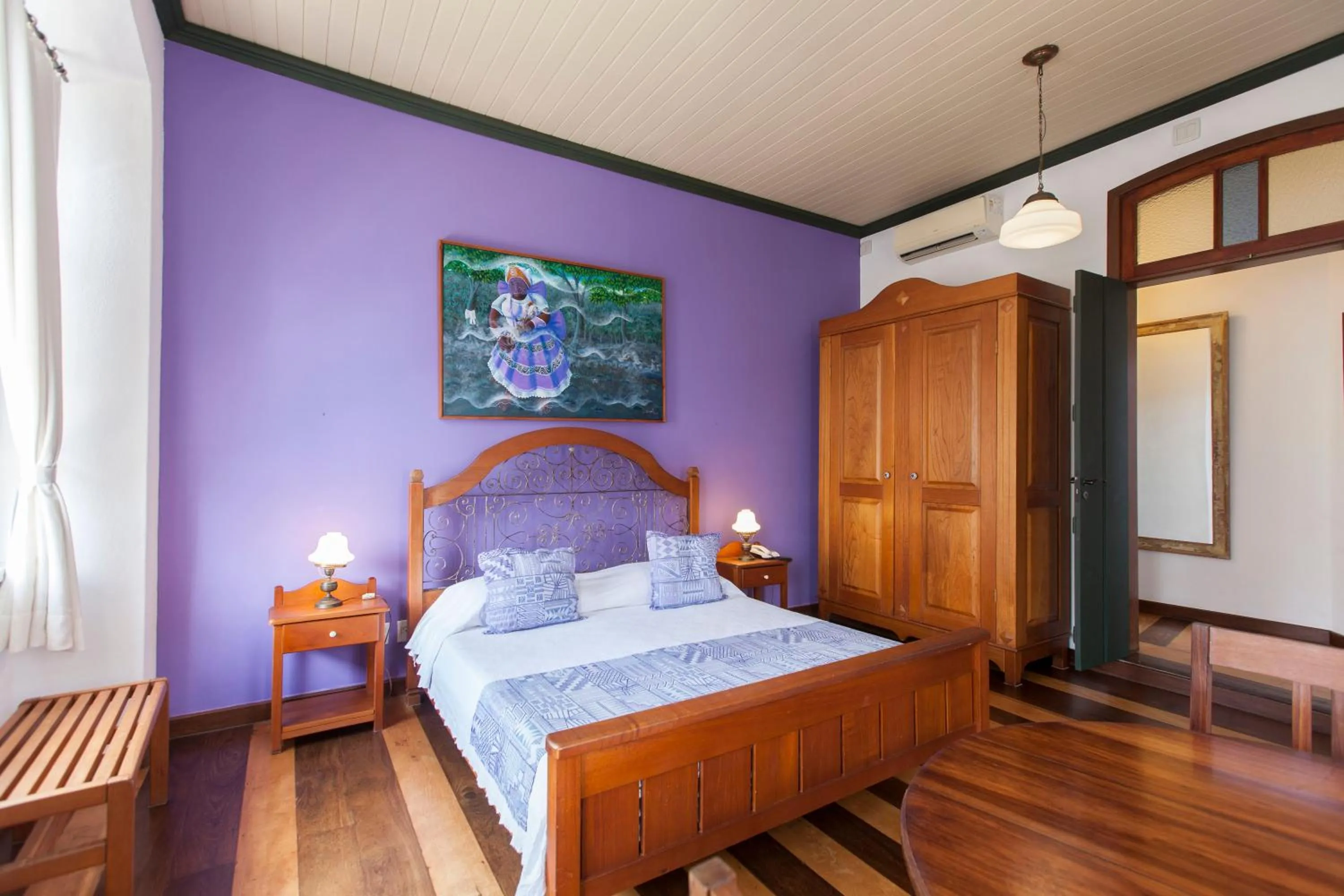 Bed in Pousada Solar dos Deuses