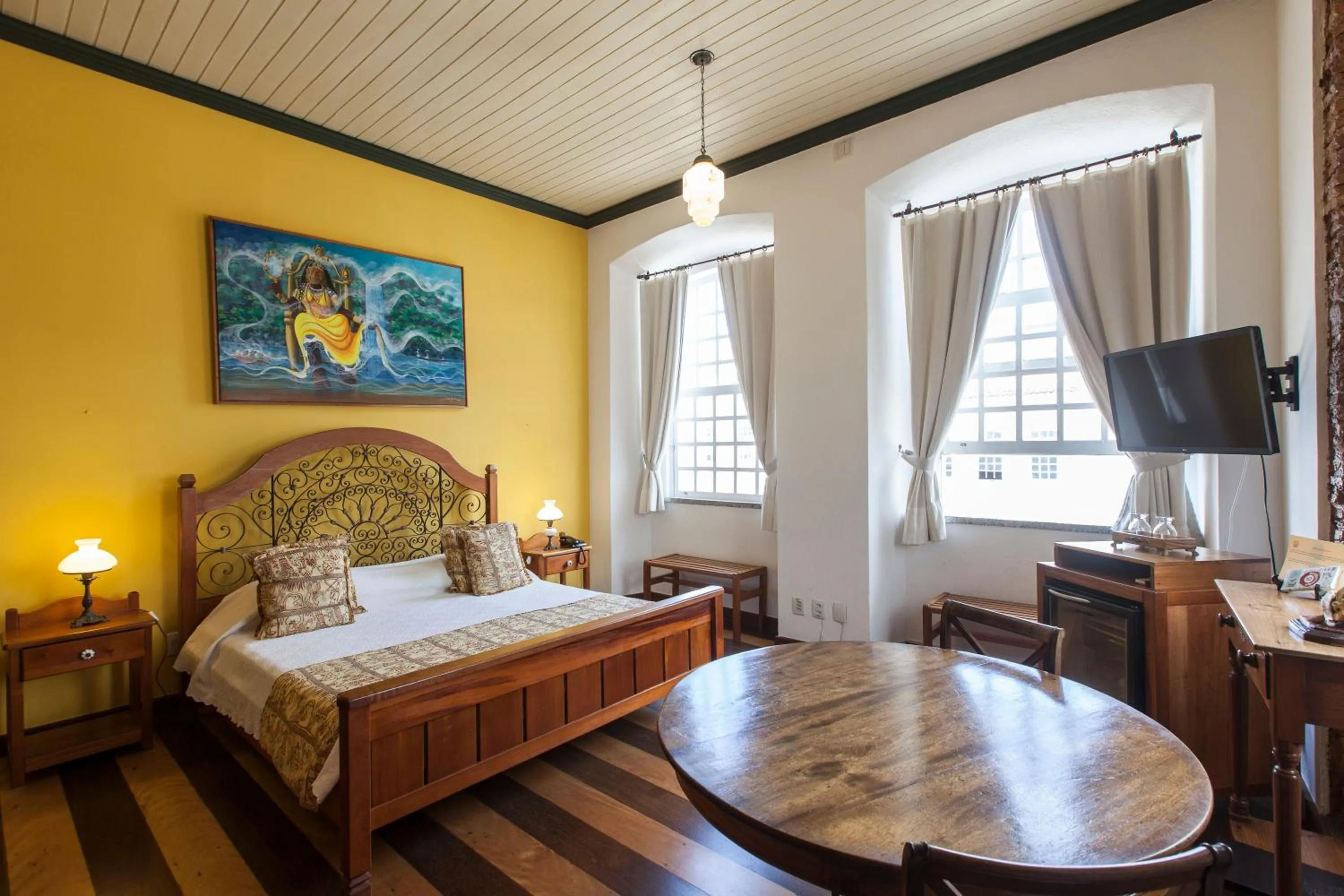 Bed in Pousada Solar dos Deuses