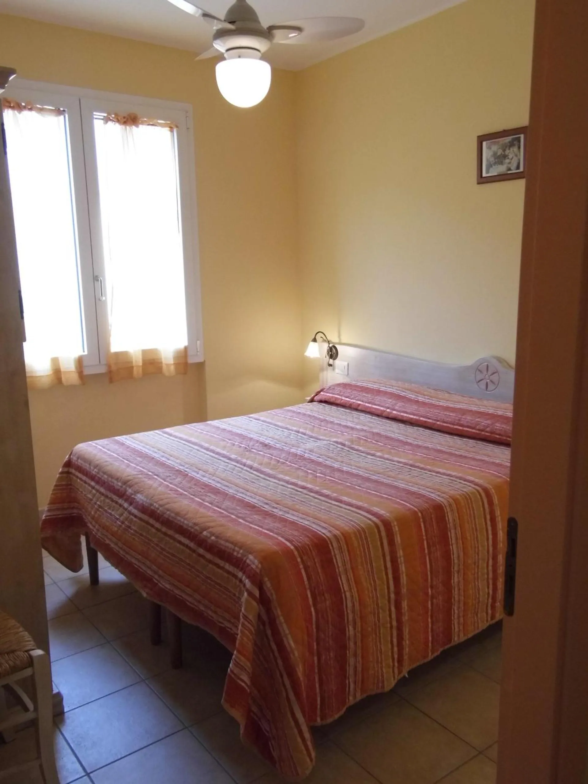 Bed in Le Nereidi Hotel & Residence