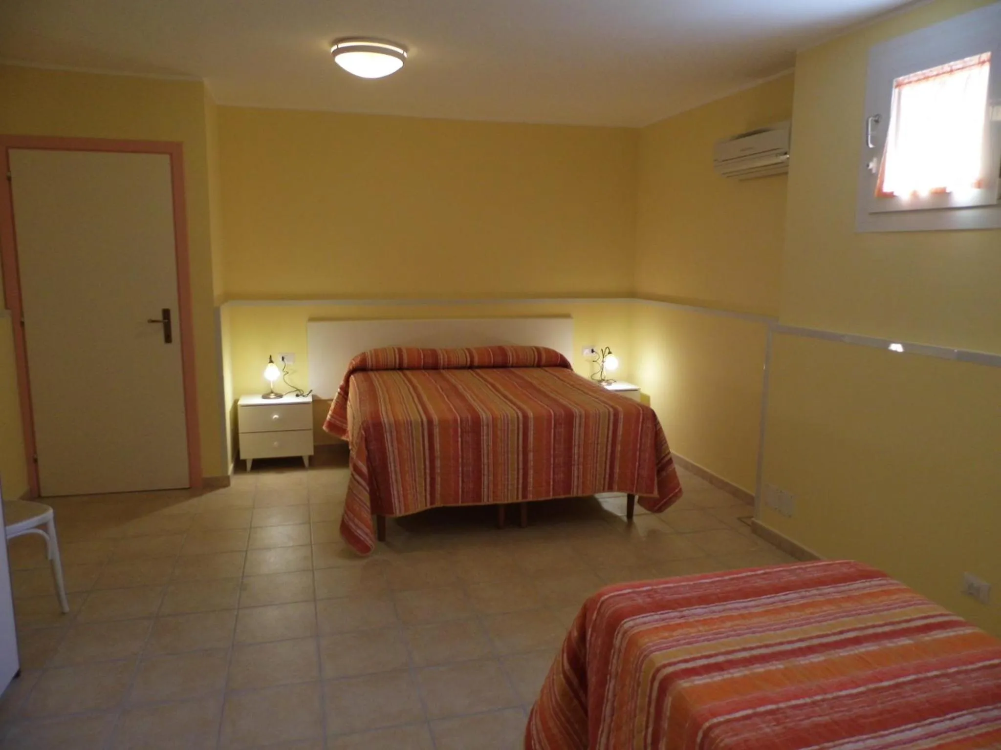 Day, Bed in Le Nereidi Hotel & Residence