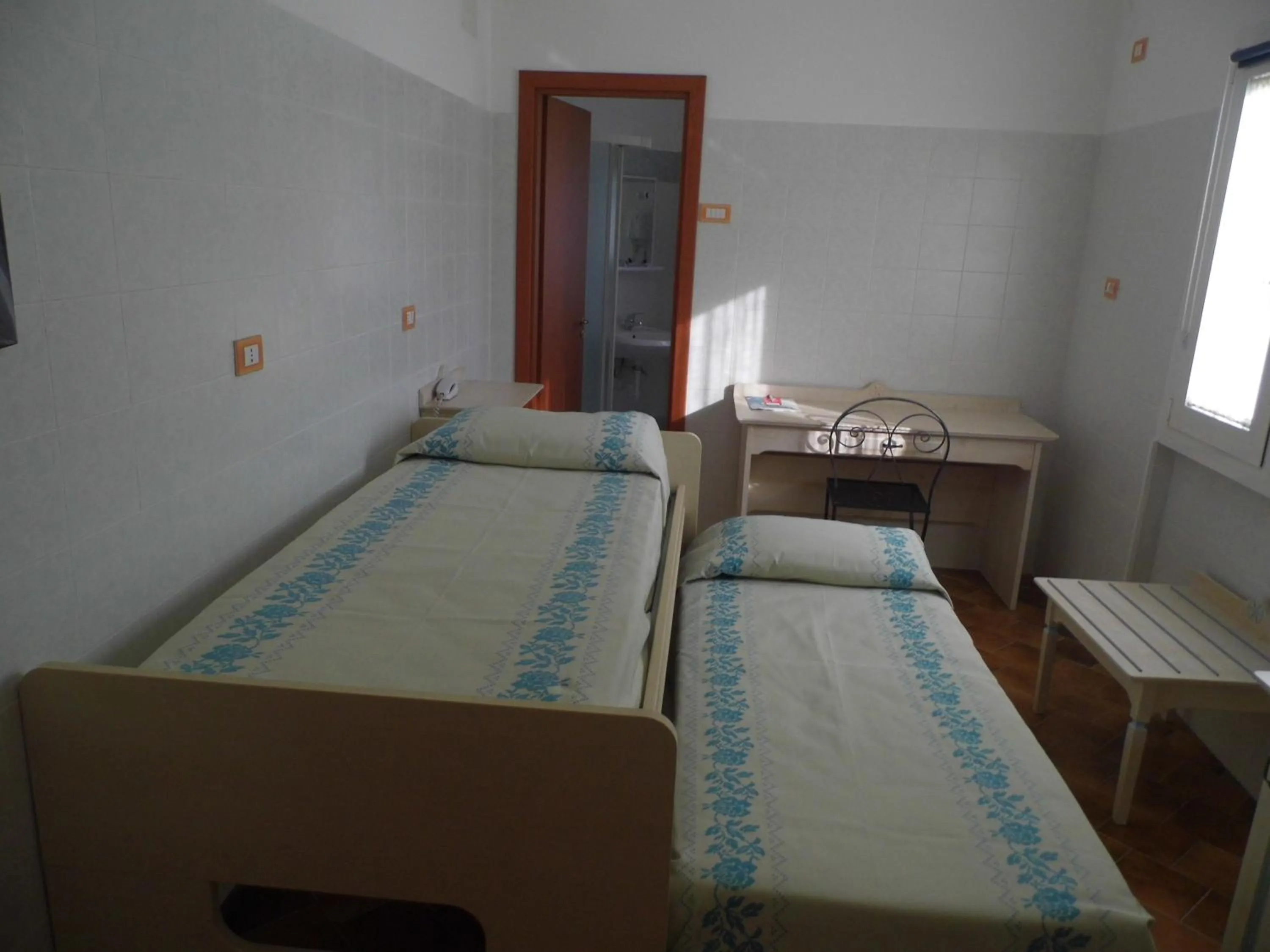 Bed in Le Nereidi Hotel & Residence