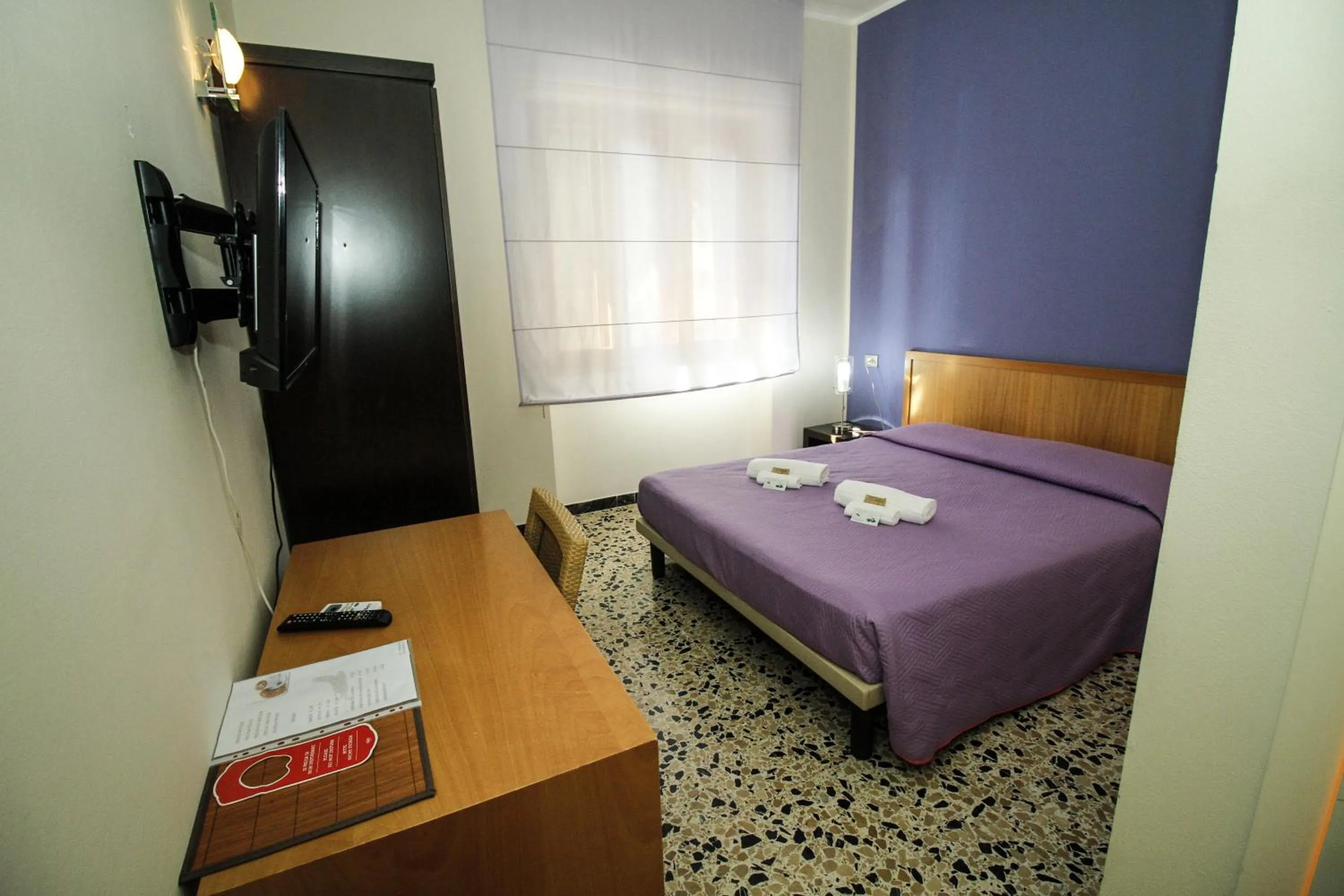 Bed in Hotel I Colori