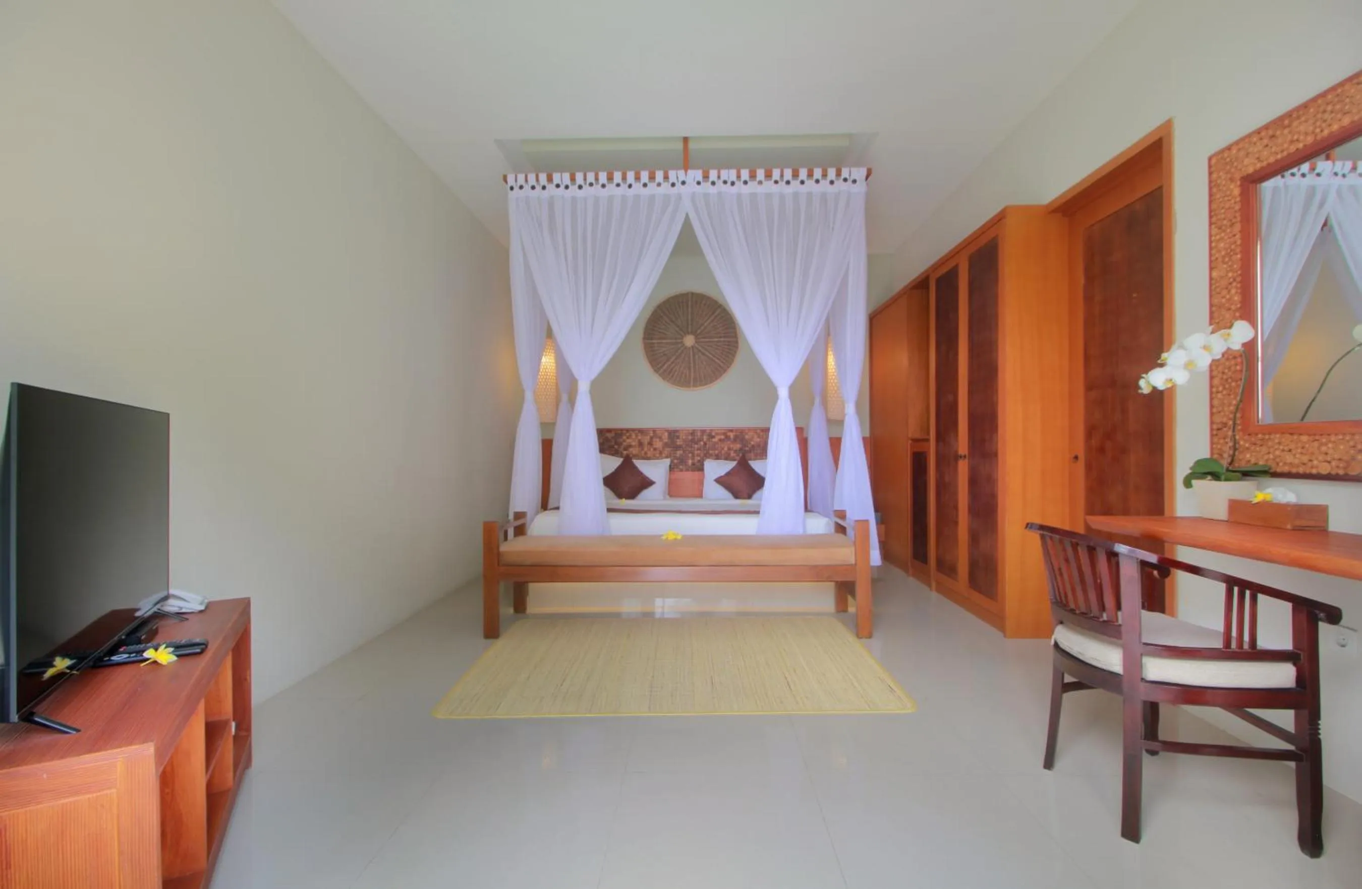 Bedroom, Bed in Maharaja Villas Bali - CHSE Certified