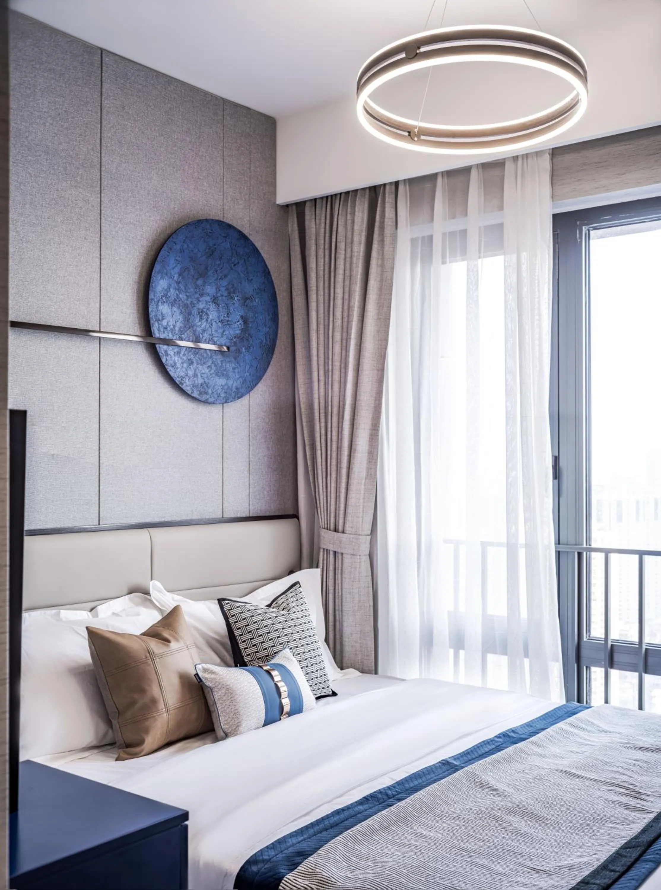 Bed in Kingkey Shuibei International Apartment Hotel