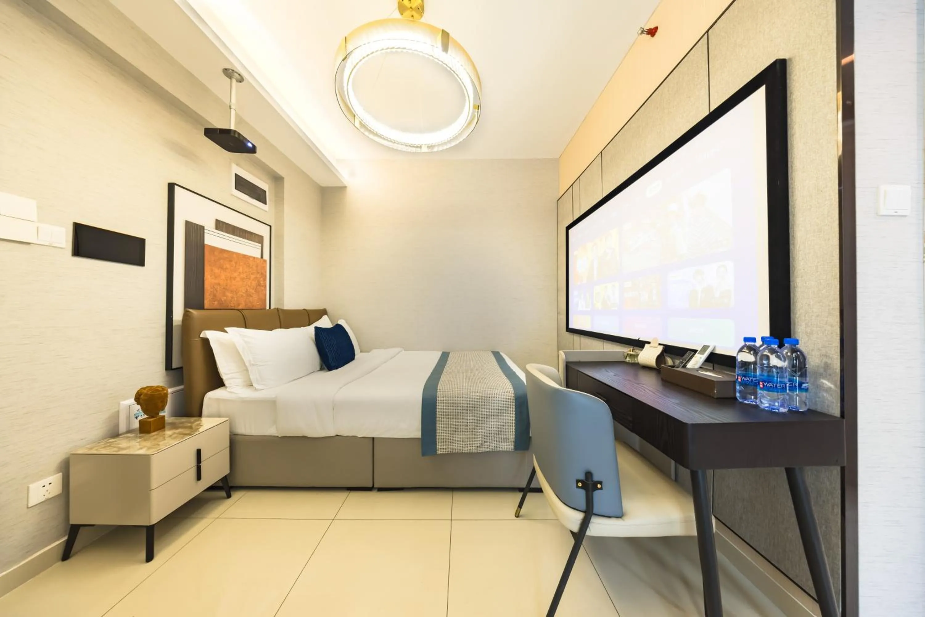 Bedroom in Kingkey Shuibei International Apartment Hotel