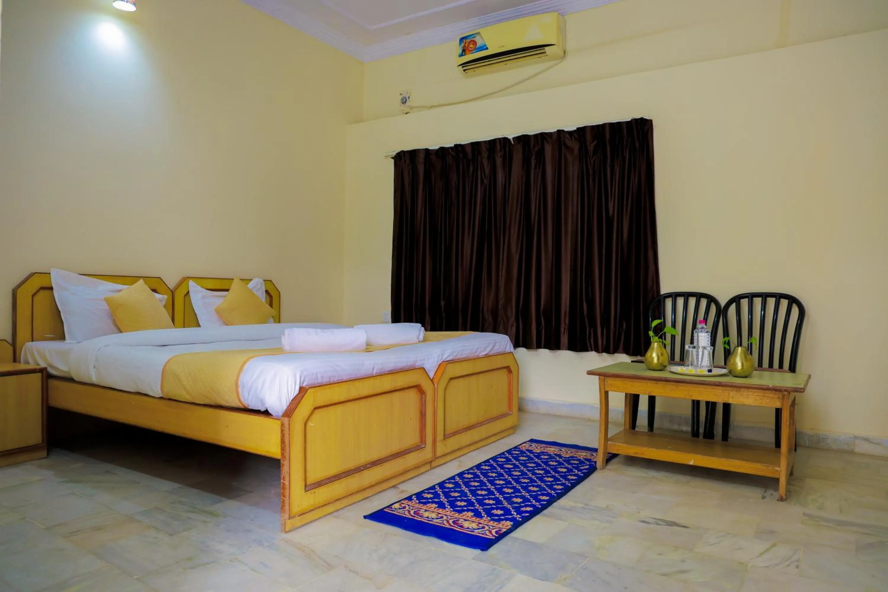 Bed in The Lala Hotel and Resort