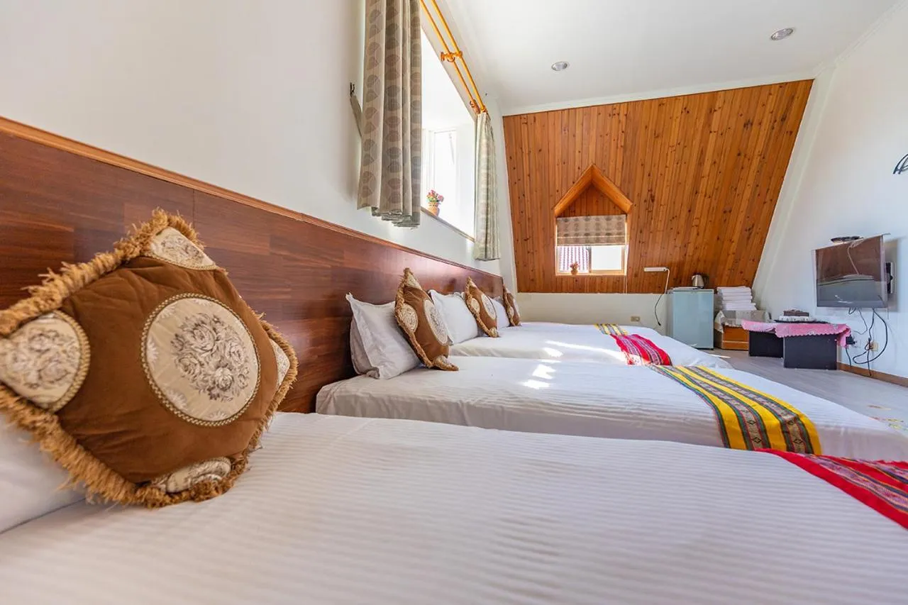 Bed in Yishin Garden B&B