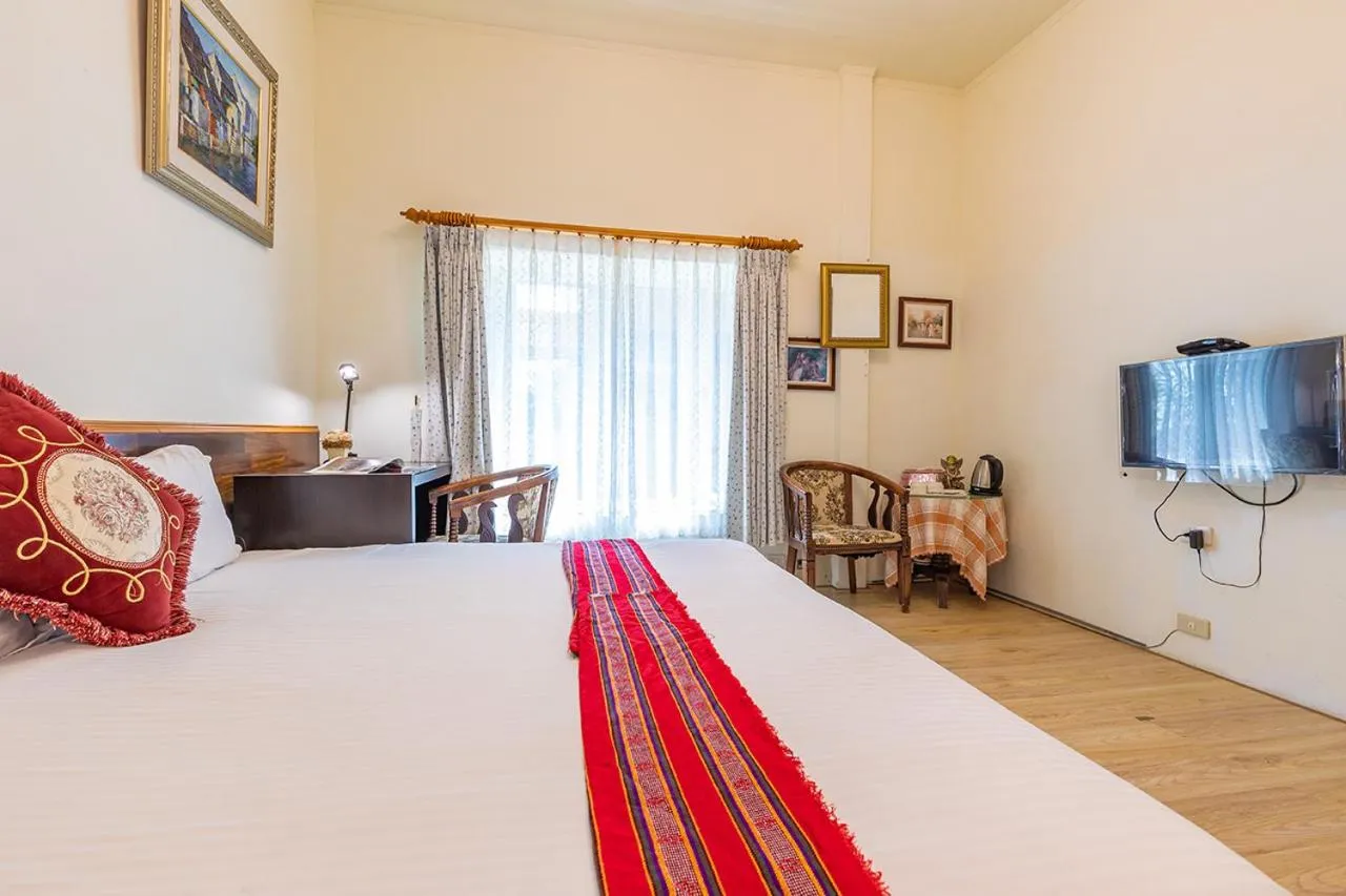 Bed in Yishin Garden B&B