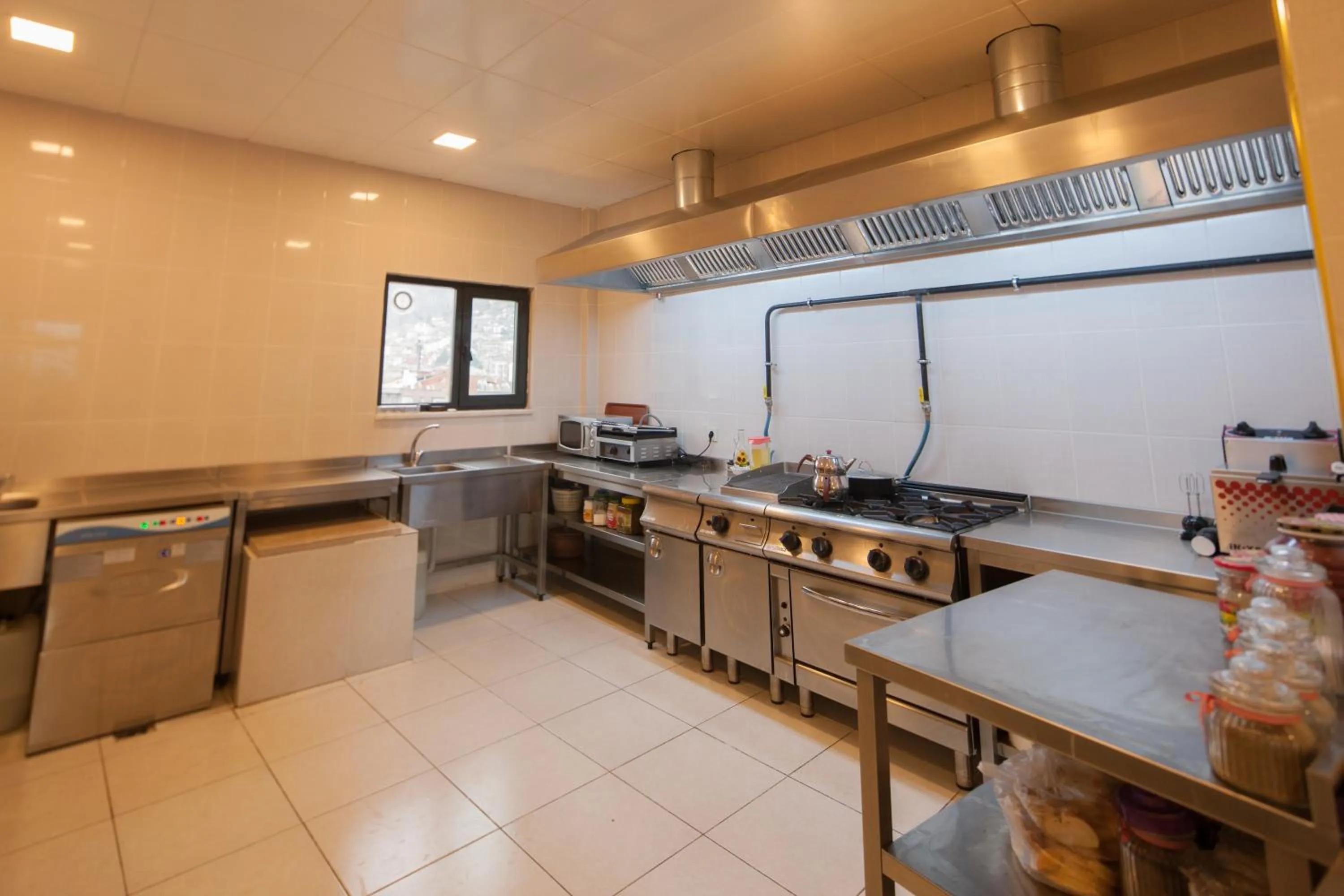 Kitchen or kitchenette in Armin Hotel