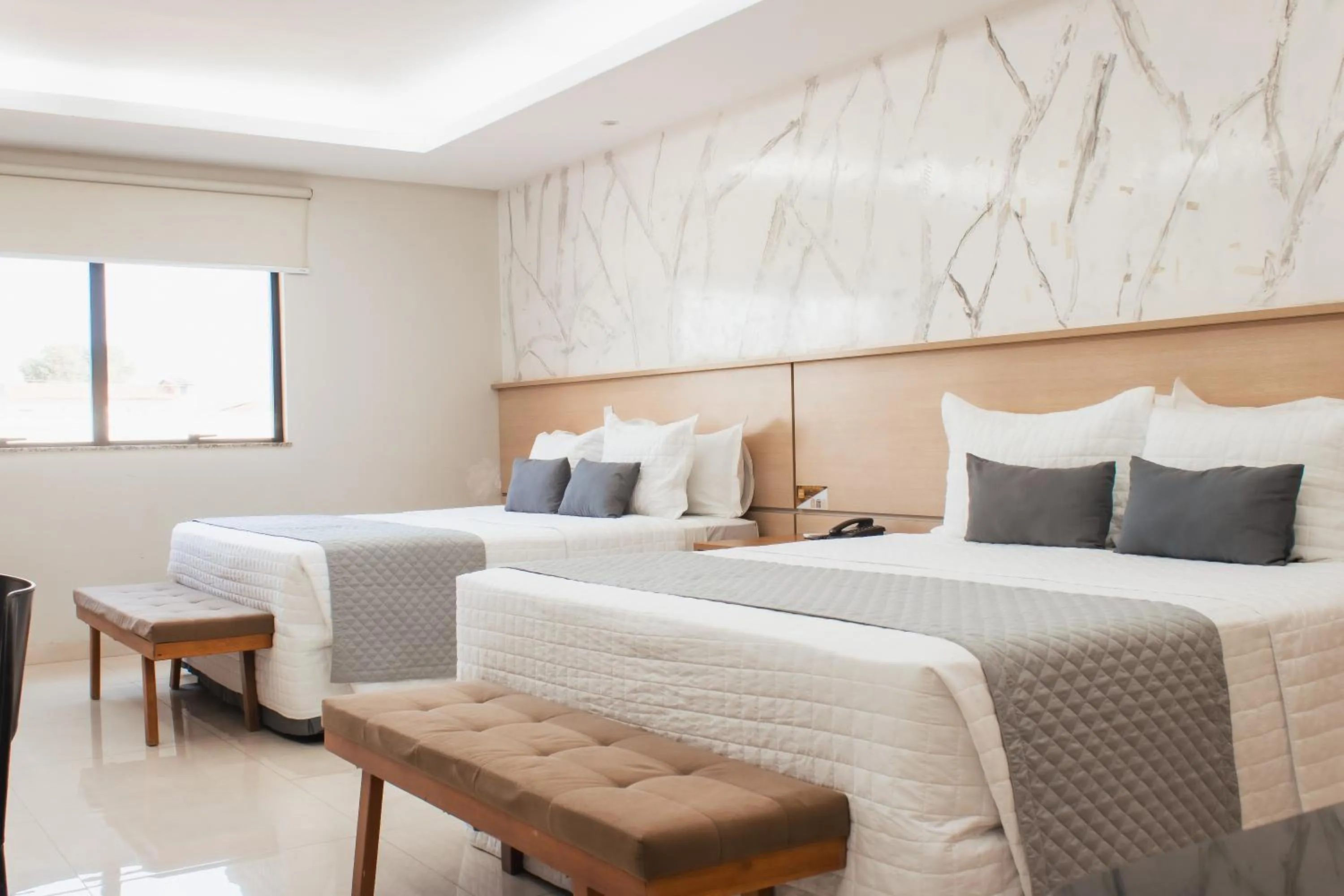 Bed in Atrium Confort Hotels