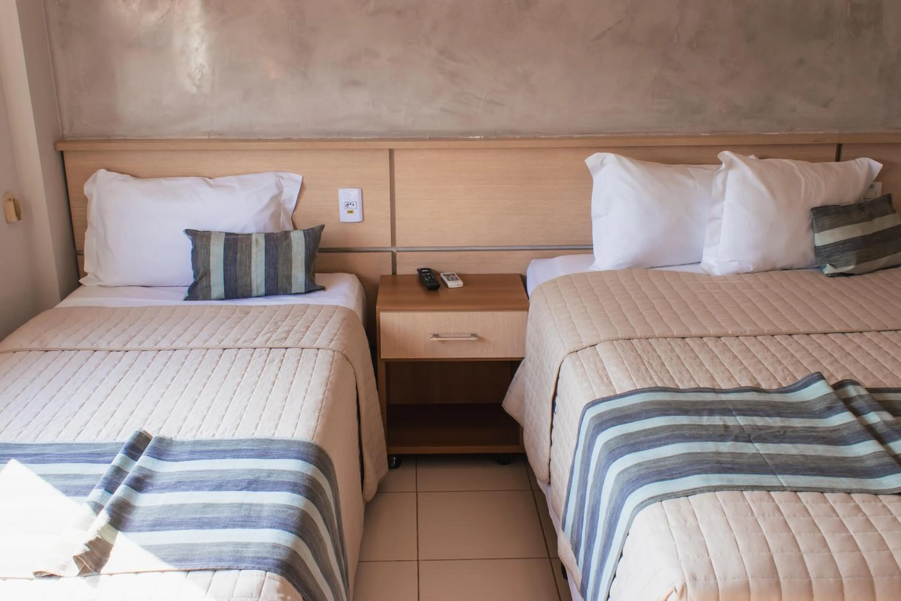 Bed in Atrium Confort Hotels