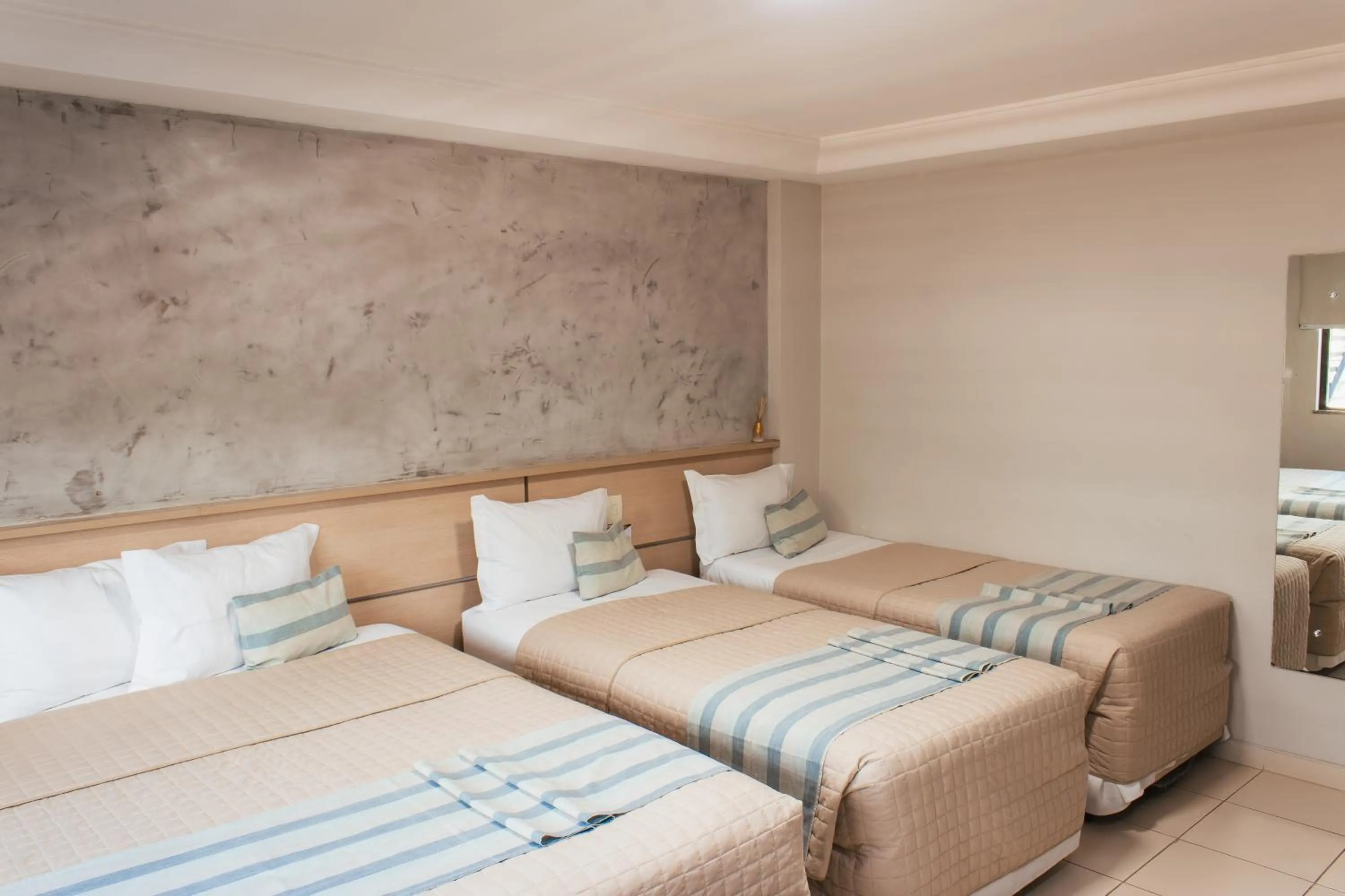 Bed in Atrium Confort Hotels