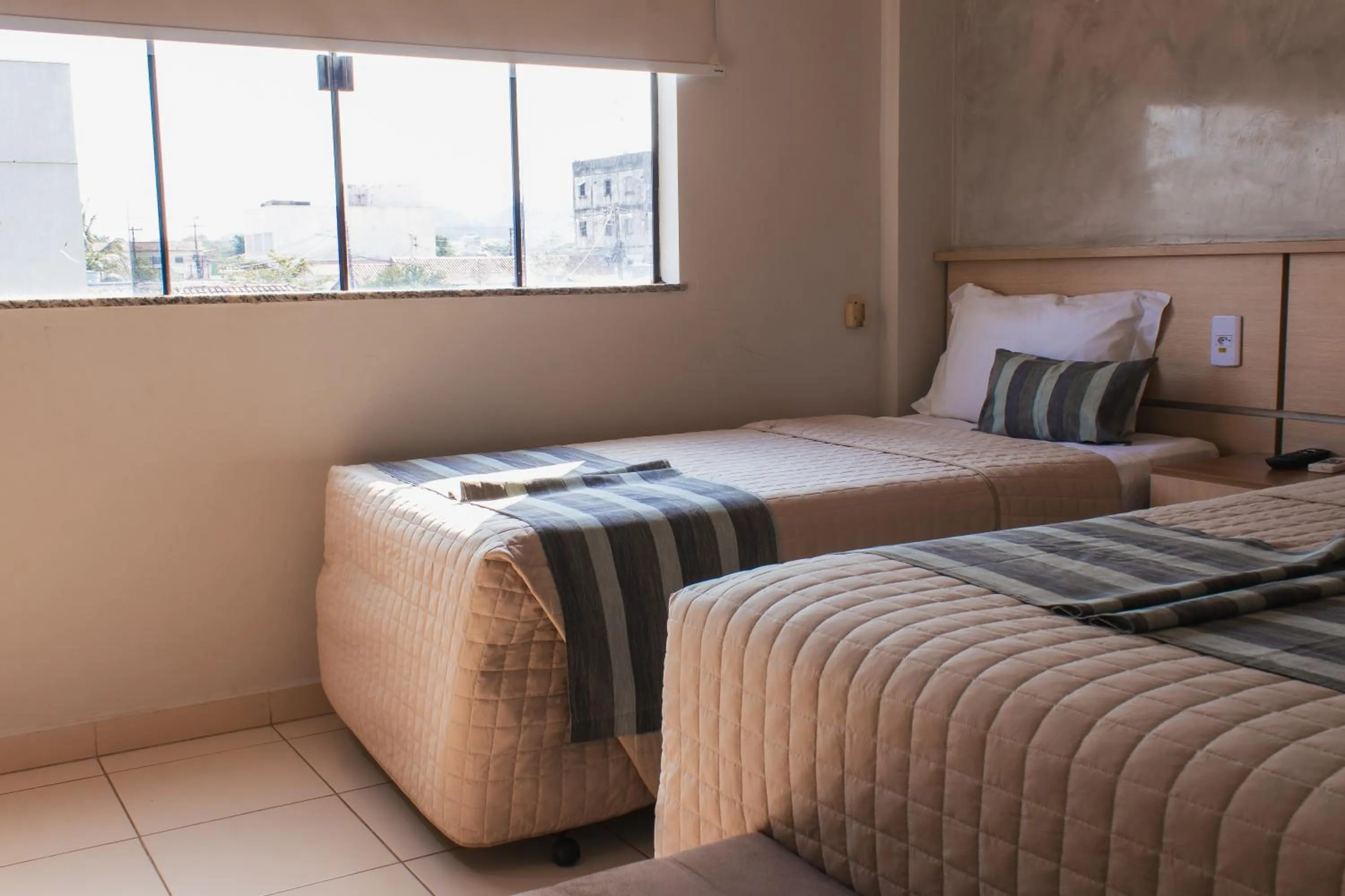 Bed in Atrium Confort Hotels