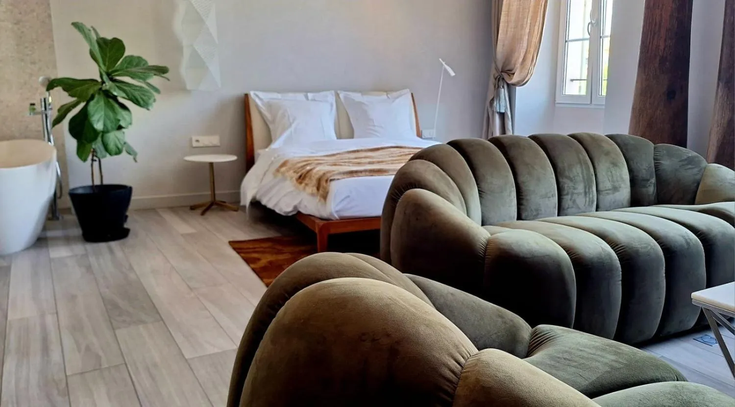 Bed in Les Suites Massena