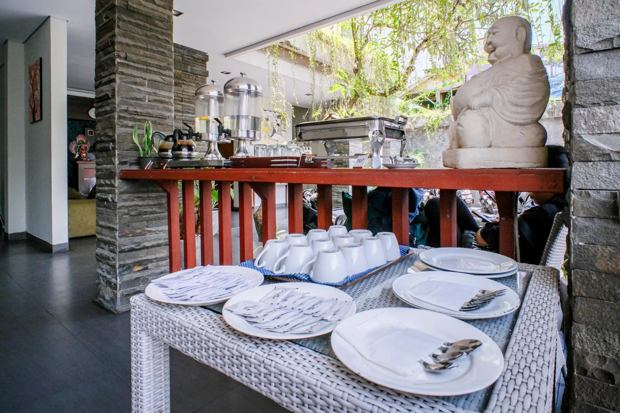 Dining area in Kamini Legian Hotel