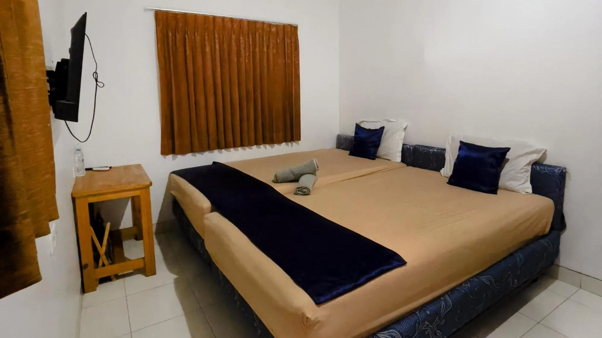 Bed in NamRoom at Tomang