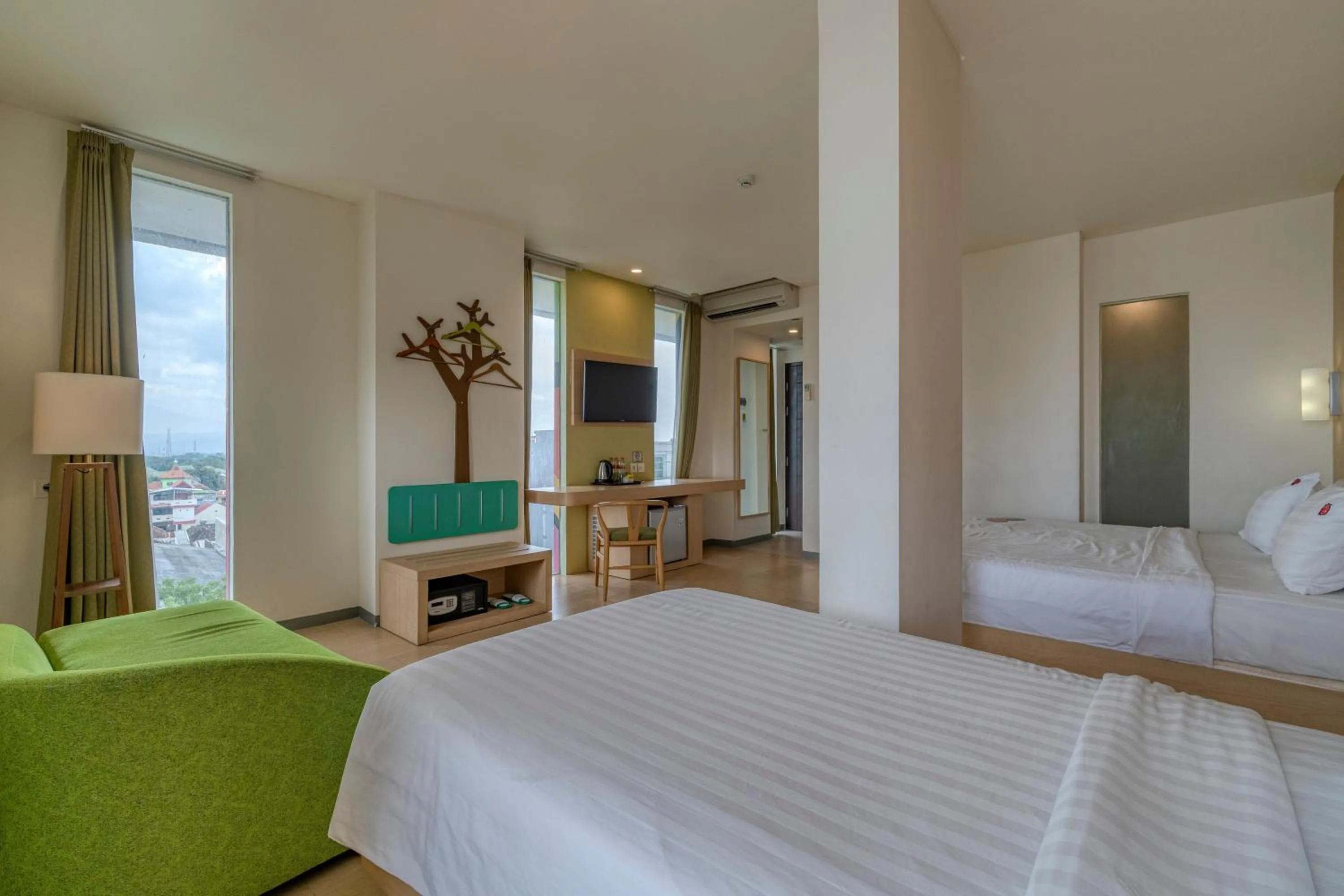 Bedroom, Bed in Ascent Hotel & Cafe Malang