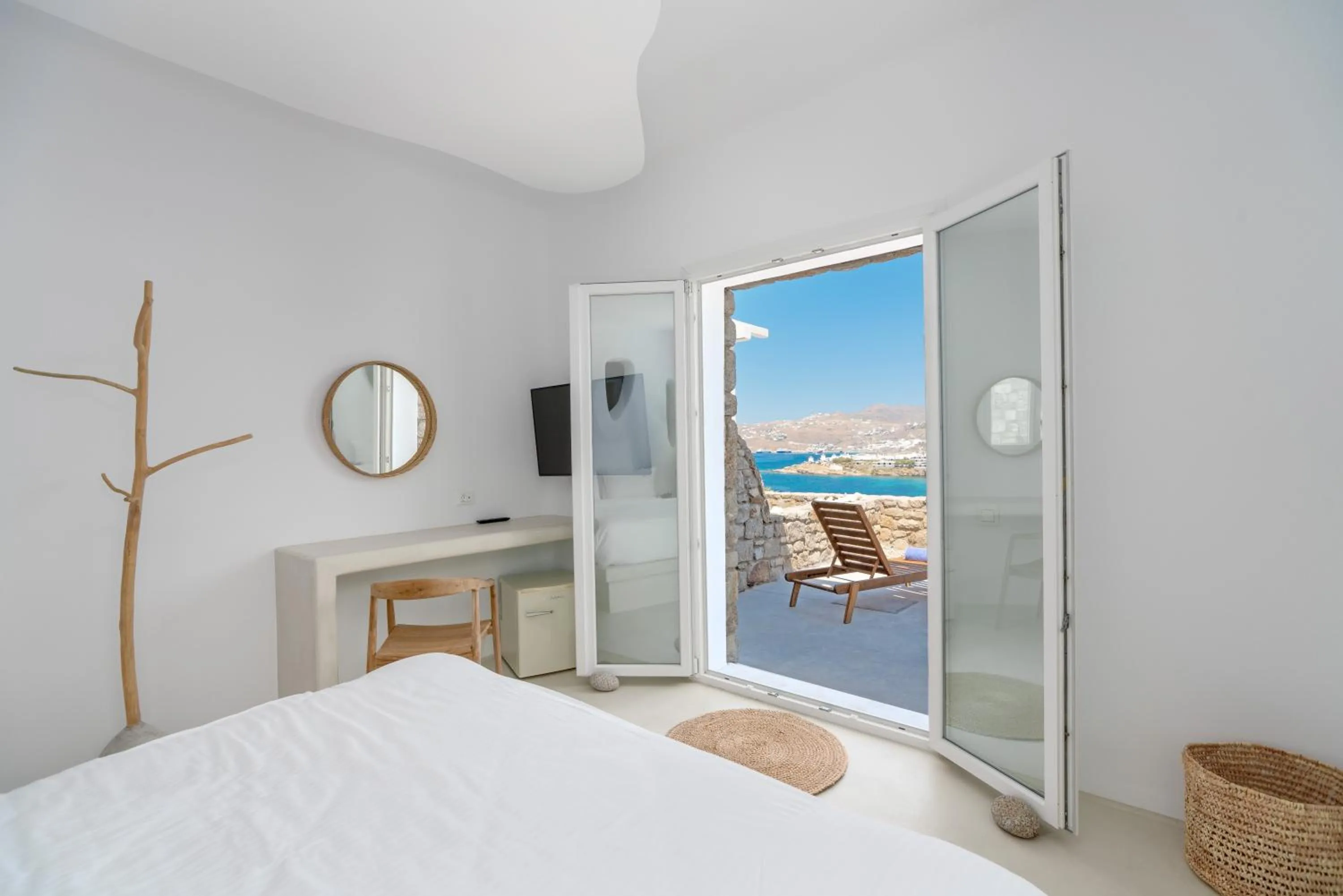 Photo of the whole room, Bed in Cape Mykonos