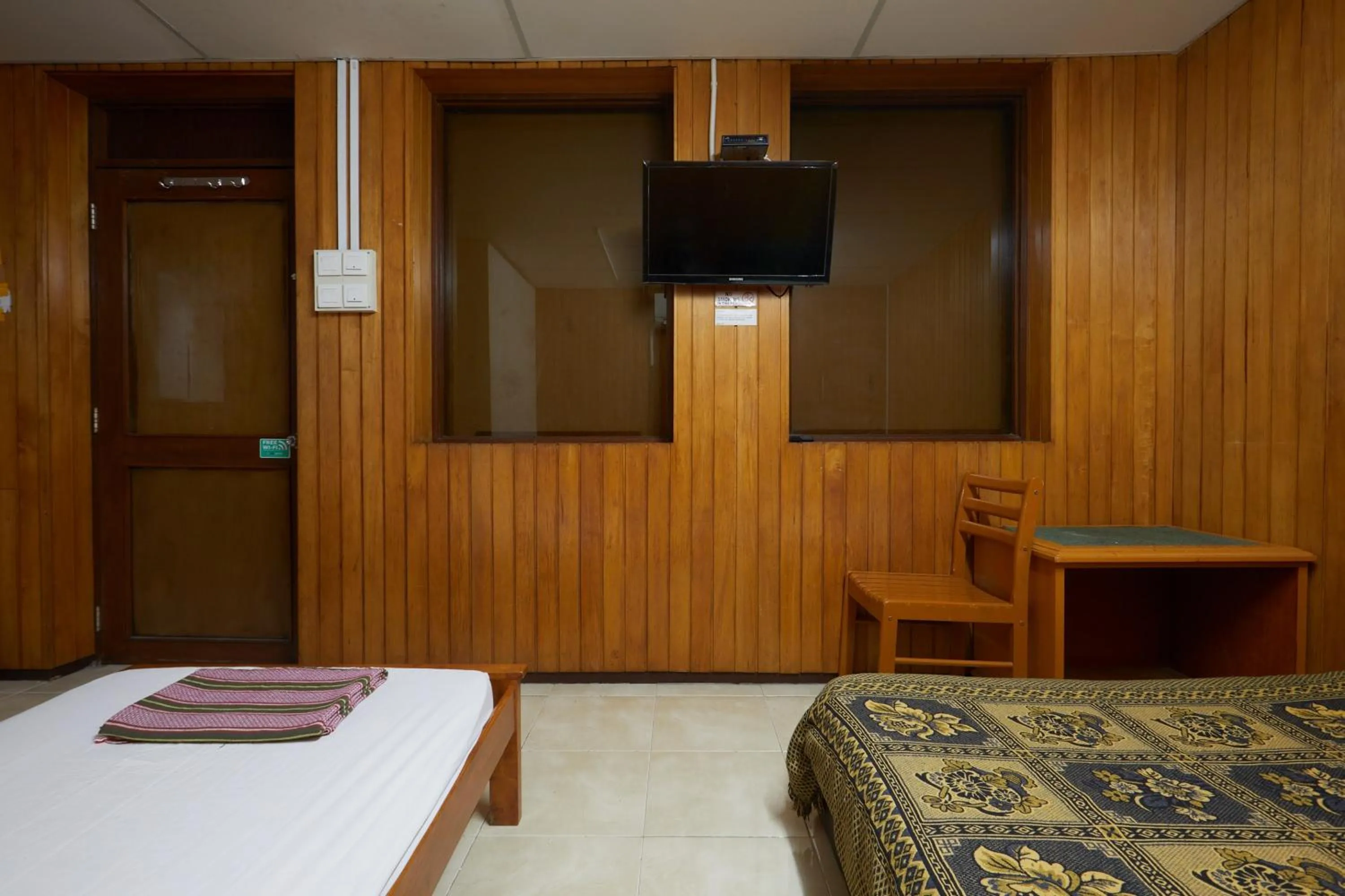 Bed in Ros Heritage Motel