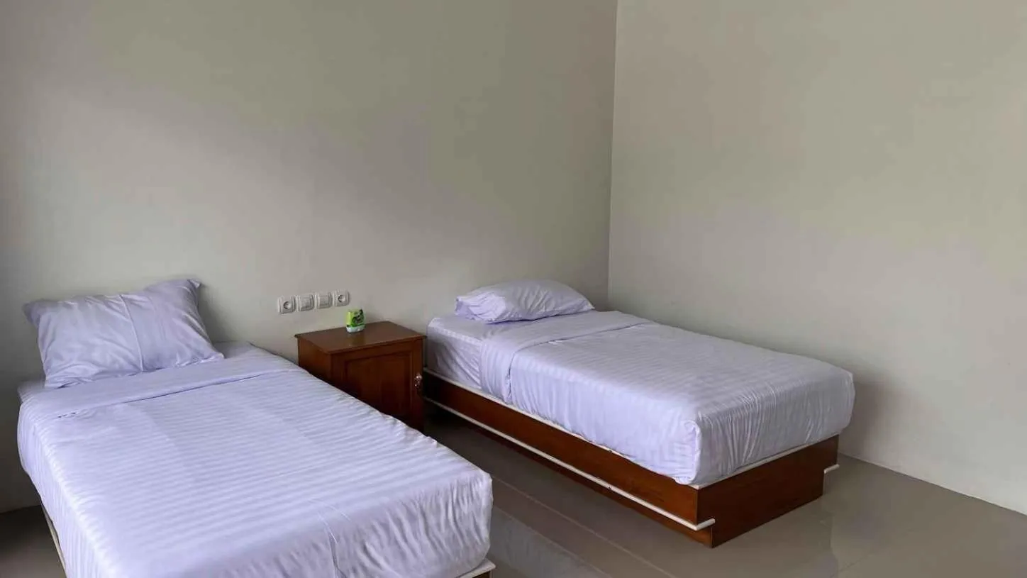 Bed in Grand Wijaya Hotel dan Villa Sarangan