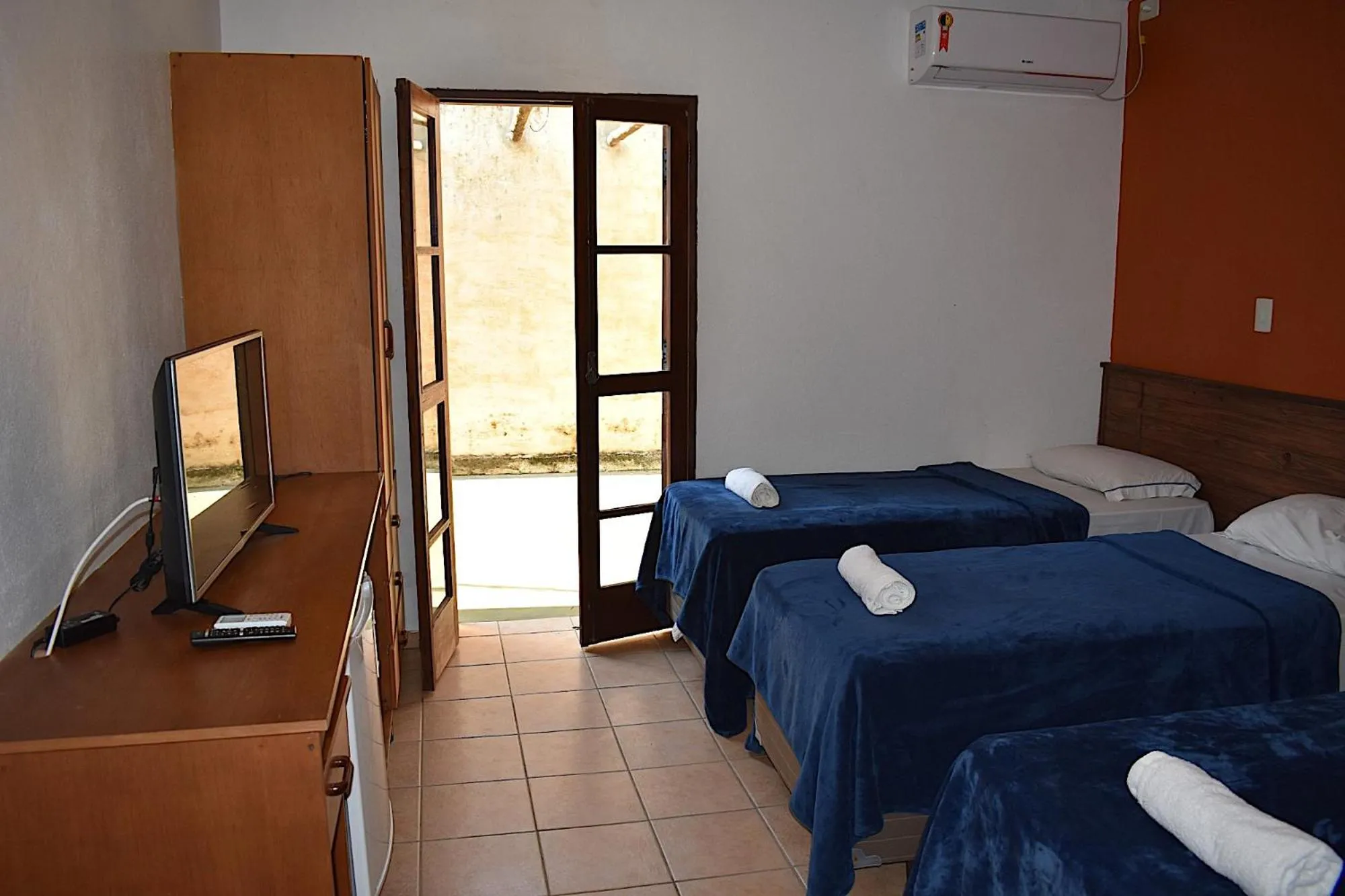 Photo of the whole room, Bed in Porto Grande Hotel & Convention