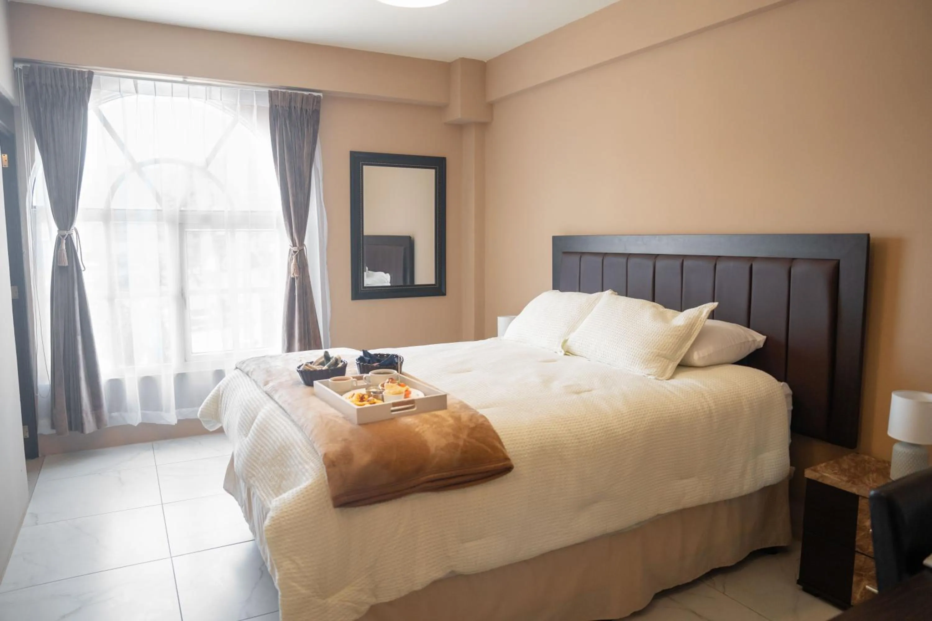 Bed in La Mansion Hotel Boutique & Restaurante