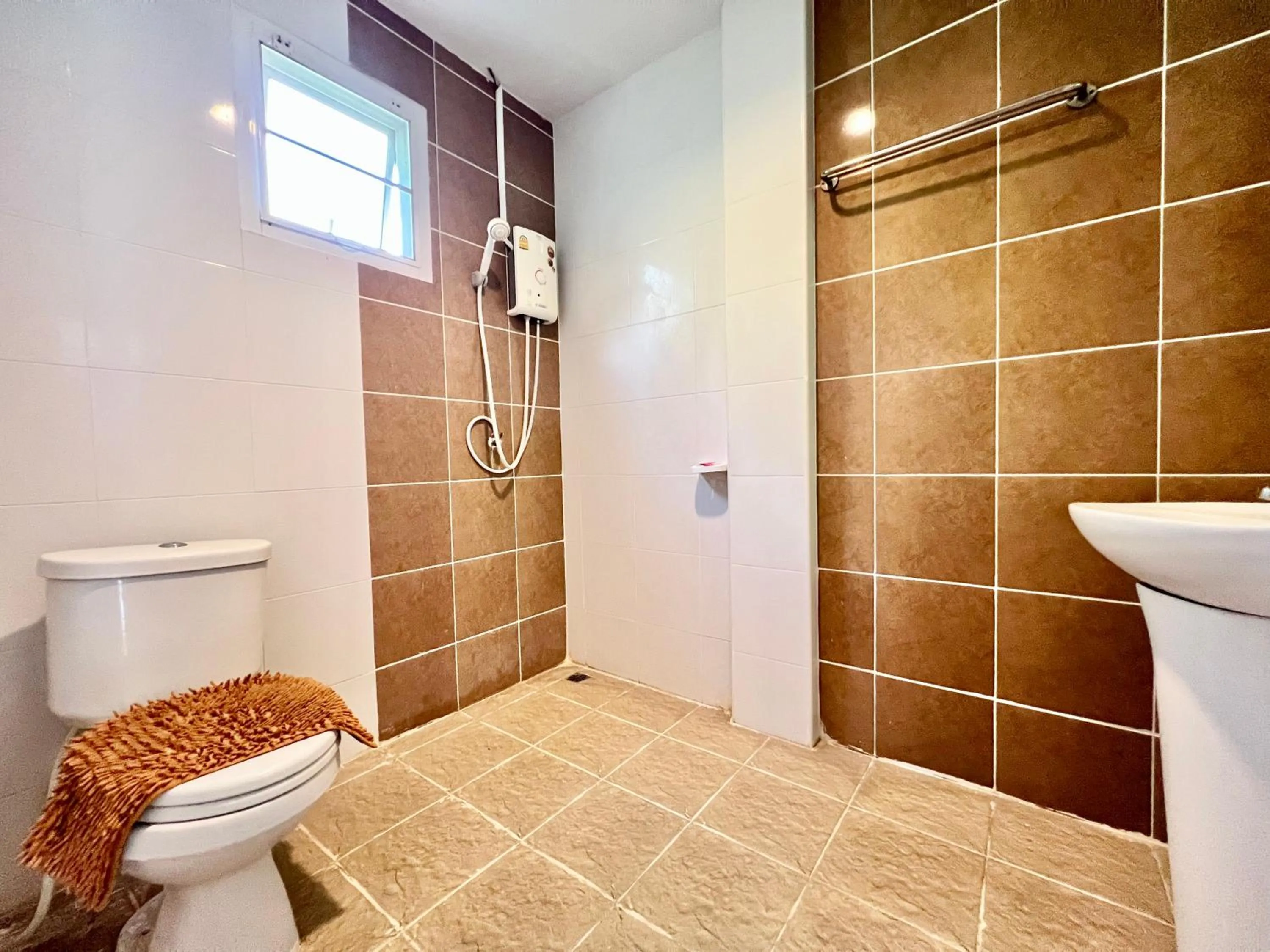 Bathroom in Rungreang Hotel