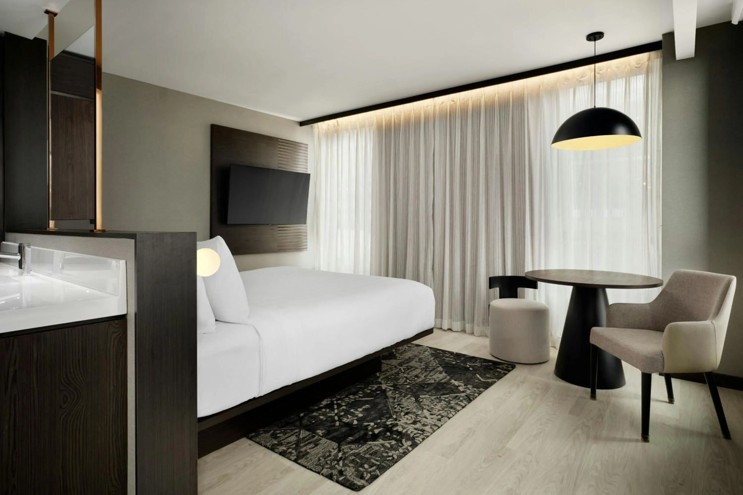 Photo of the whole room, Bed in AC Hotel by Marriott Burlington