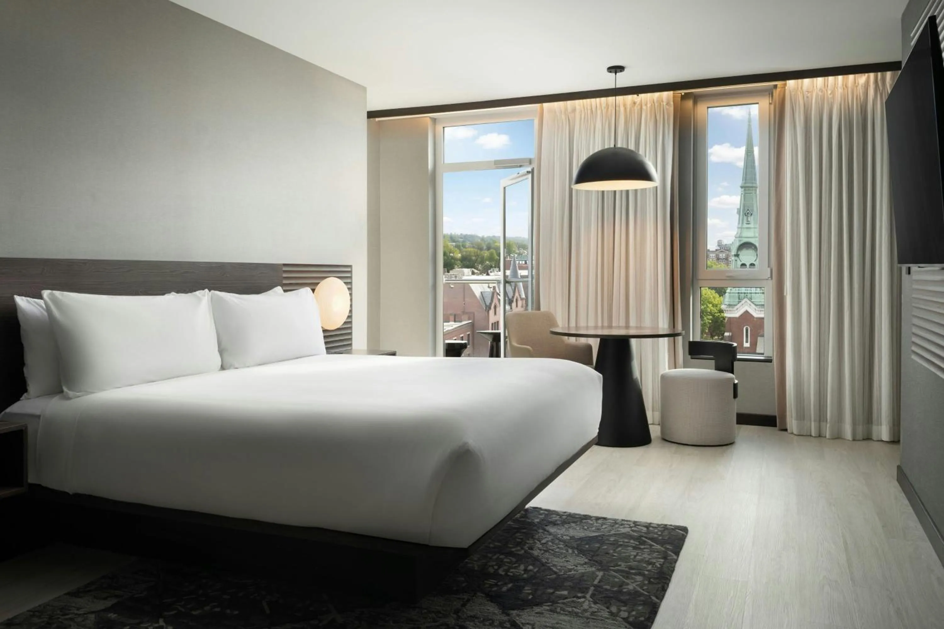 Photo of the whole room, Bed in AC Hotel by Marriott Burlington