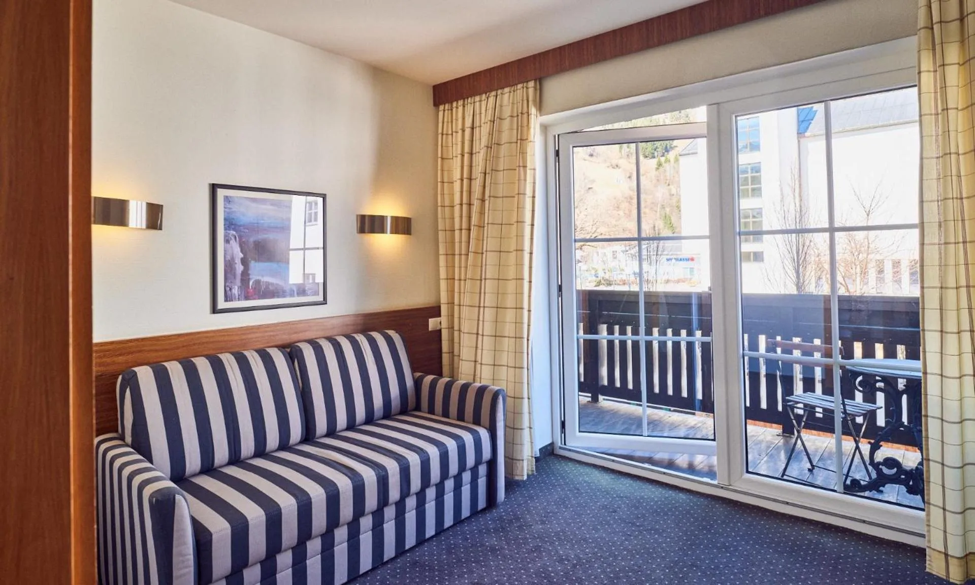 Bed in Hotel Pinzgauerhof by Alpeffect Hotels