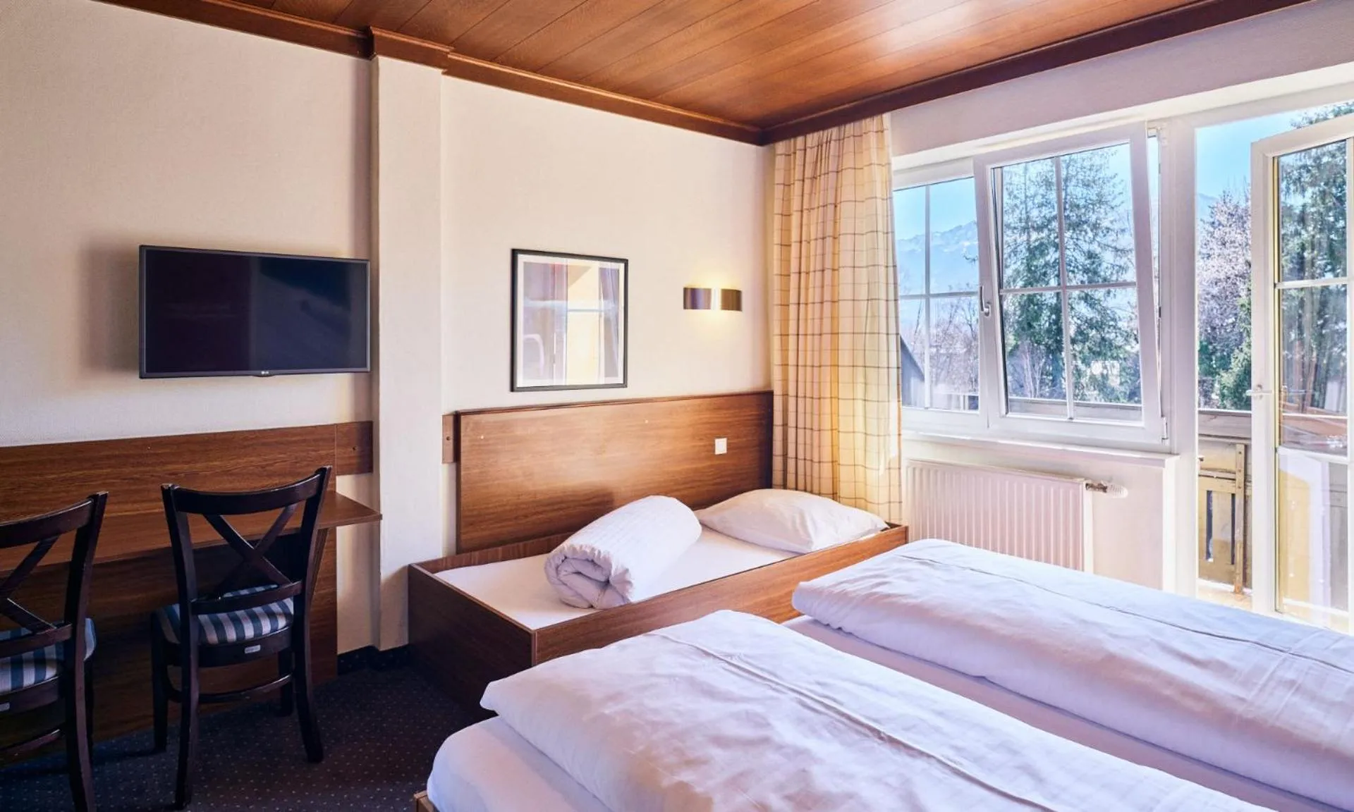 Bedroom, Bed in Hotel Pinzgauerhof by Alpeffect Hotels