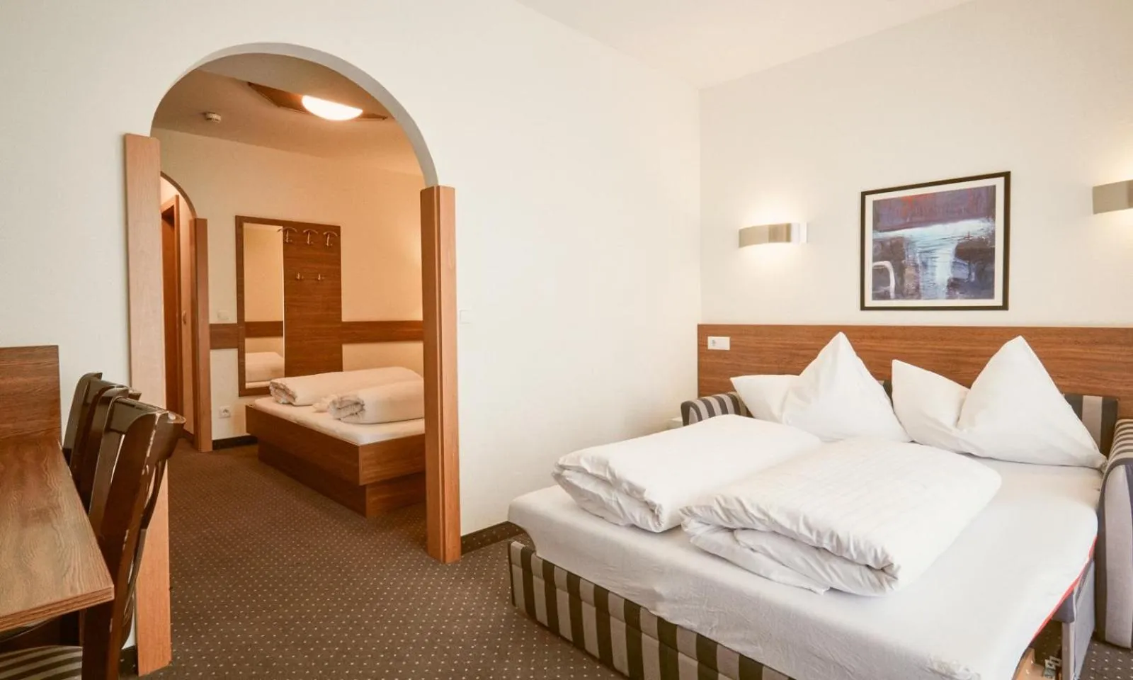 Bedroom, Bed in Hotel Pinzgauerhof by Alpeffect Hotels