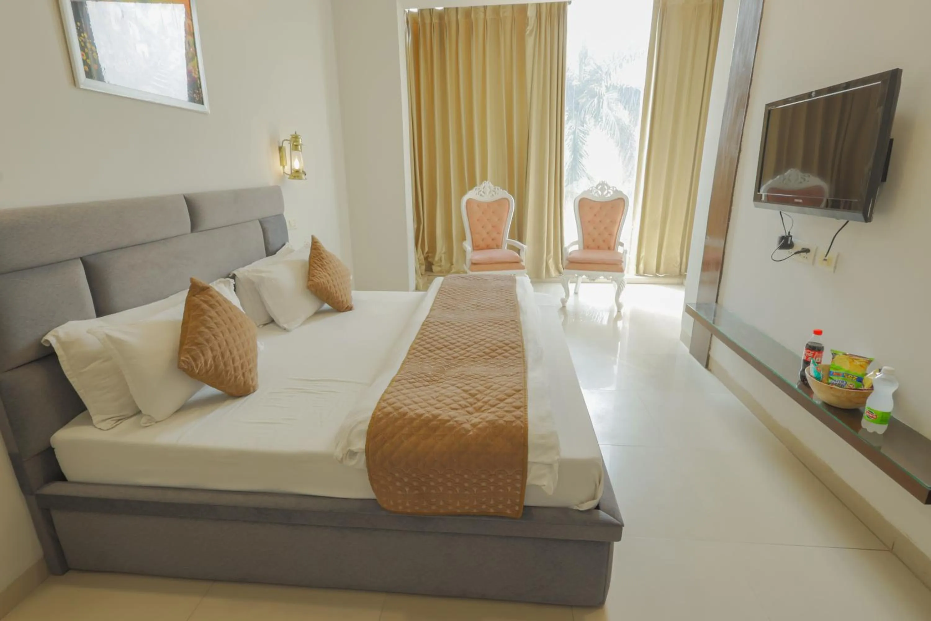 Bed in Hotel Maharani Regency