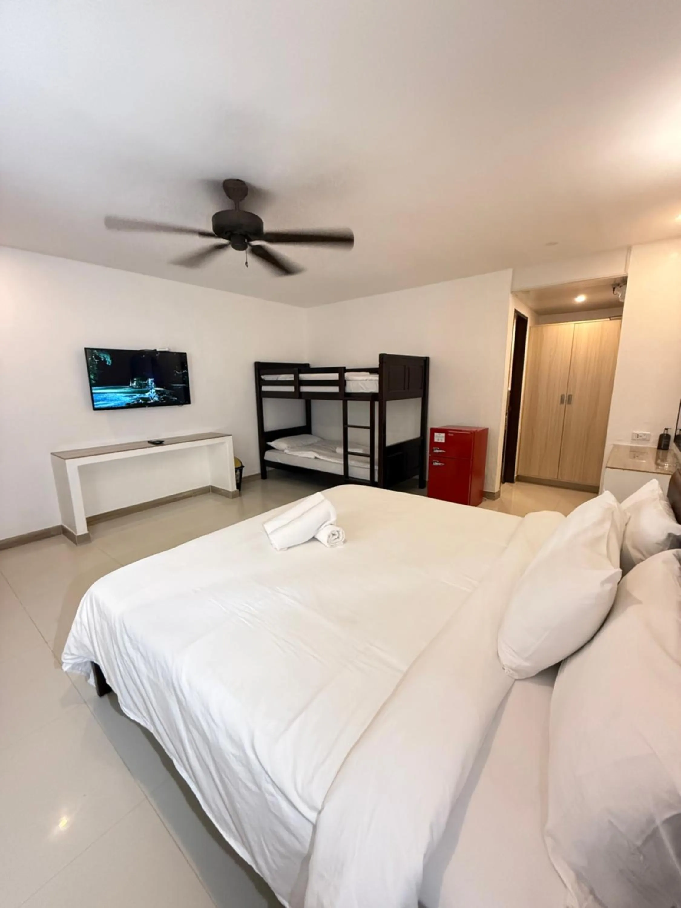 Bedroom, Bed in Calypso Beach and Dive Resort