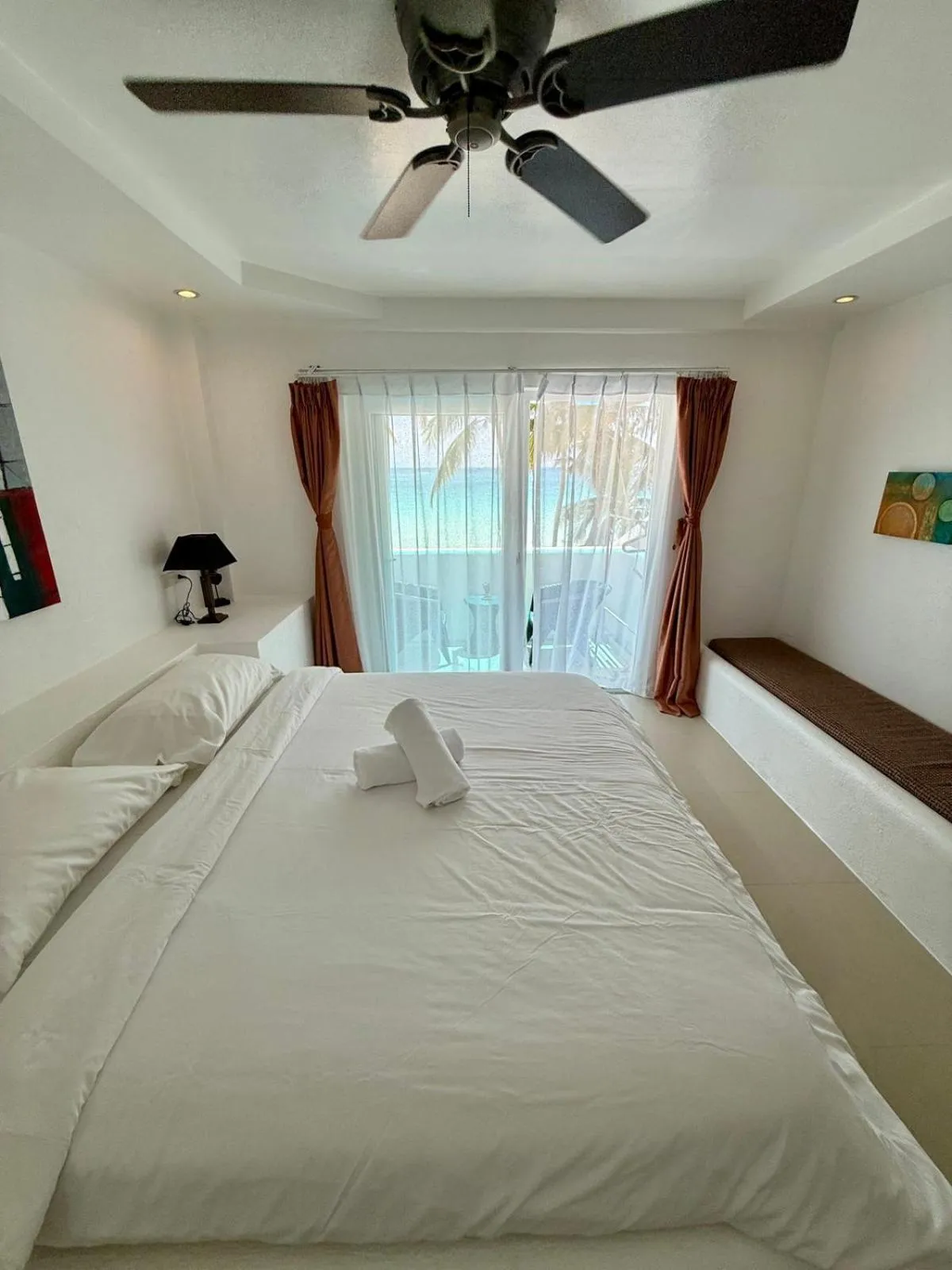 Bed in Calypso Beach and Dive Resort
